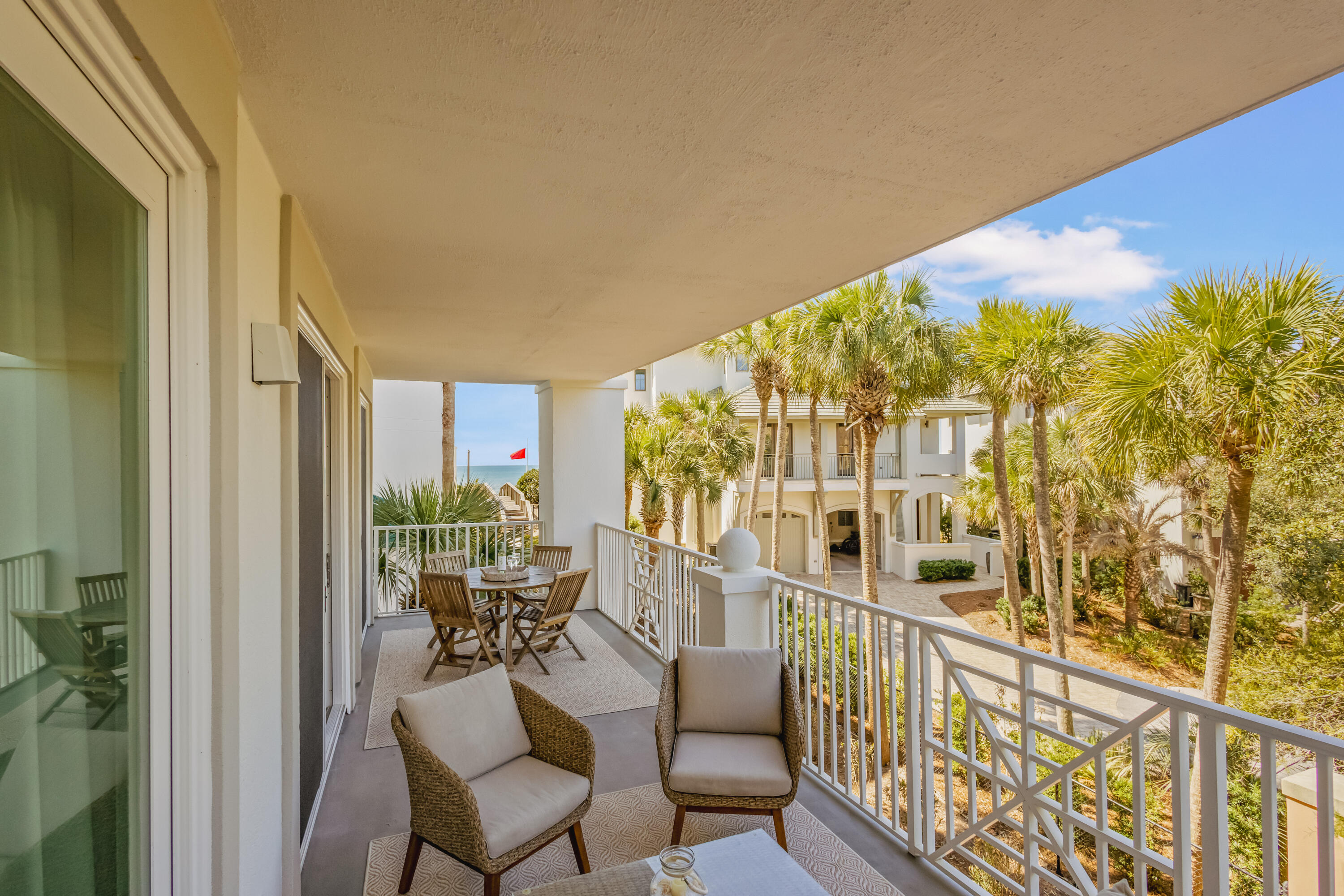 Enjoy serene partial gulf views from the expansive private balcony of this beautifully positioned condo at Blue Mountain Beach Condos, ideally located south of 30A in a quiet, private setting between two exclusive residential communities. This boutique building features only 48 residences and offers convenient indoor access through a stunning atrium, creating a welcoming arrival experience. Residents and guests enjoy deeded beach access along with a wide array of resort-style amenities, including:

Beachfront community pool and hot tub
Gated security
Two elevators
Beach chair service
Fitness center
Basketball court
Community grilling area
 
This property also boasts a strong and successful rental history, making it an excellent opportunity for both personal enjoyment and investment.