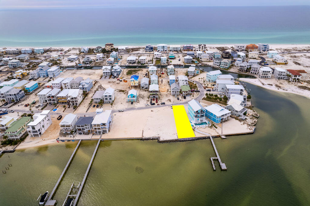 *ENTERED FOR COMP PURPOSES* The west end is the best end; welcome to your future oasis on Navarre Beach. Lot 19 in Grand Navarre is a stunning waterfront gem that boasts 45ft of width and a staggering 143ft of depth directly on the Santa Rosa Sound featuring a brand new seawall. The property is angled for not only sunset views but unobstructed views of the National Seashore coastline; a rare treat. Just a stone's throw distance to the Gulf of Mexico and public beach access; this location is key for building your personal peaceful retreat, expanding your investment portfolio by building a renters dream destination, or becoming a full time resident of the tight knit community of Grand Navarre with NO HOA. This blank canvas with panoramic views allows for endless possibilities! Let's bring your vision to life. Ask about custom drawn plans for this premier property.