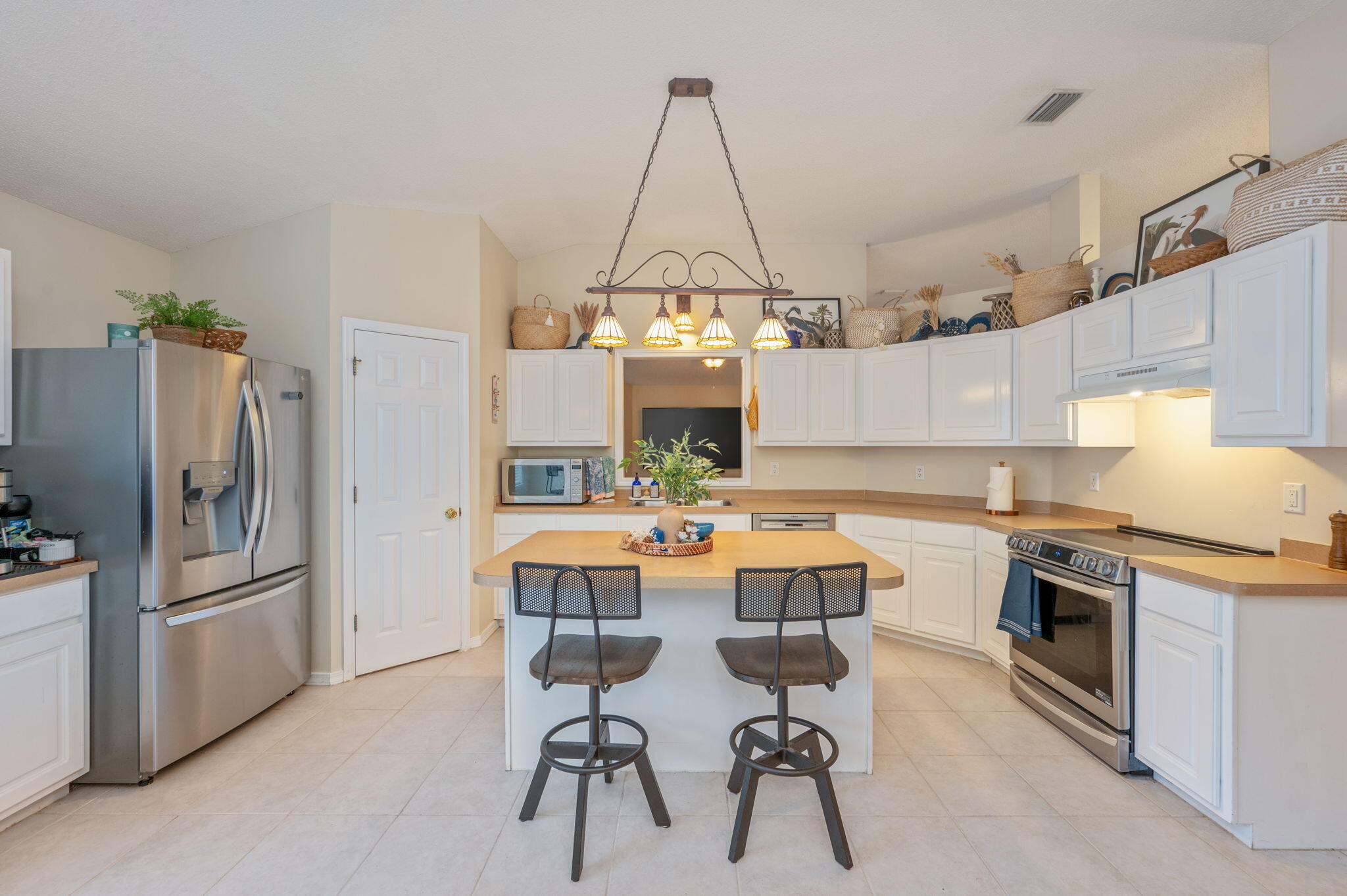 Looking for move-in ready convenience? Well, you have found it here at 1625 Trent Street. Located just 1.2 miles from Hurlburt Field's East Gate in one of the area's most military-friendly neighborhoods, this home checks every box. Skip the legendary Hurlburt traffic -- you're literally 4 minutes from gate to driveway.

Inside, you'll find brand-new luxury vinyl plank flooring throughout, setting the tone for a home that's as stylish as it is functional. The oversized eat-in kitchen features an island perfect for meal prep, entertaining, or morning coffee. The spacious living room centers around a cozy fireplace with room to spare for even the largest sectional -- and a bonus secondary living space gives you the flexibility for a home office, playroom, or guest retreat.

The primary suite is a true sanctuary, easily fitting a king bed and full furniture set, and boasting a private bath plus two walk-in closets. Step outside to your screened back porch for a peaceful escape, and rest easy knowing the home is equipped with metal hurricane shutters for added protection and peace of mind. A welcoming front porch completes the picture.

With fully paid-off solar panels keeping energy costs low and brand-new luxury vinyl plank flooring throughout, this home delivers savings and style from day one.