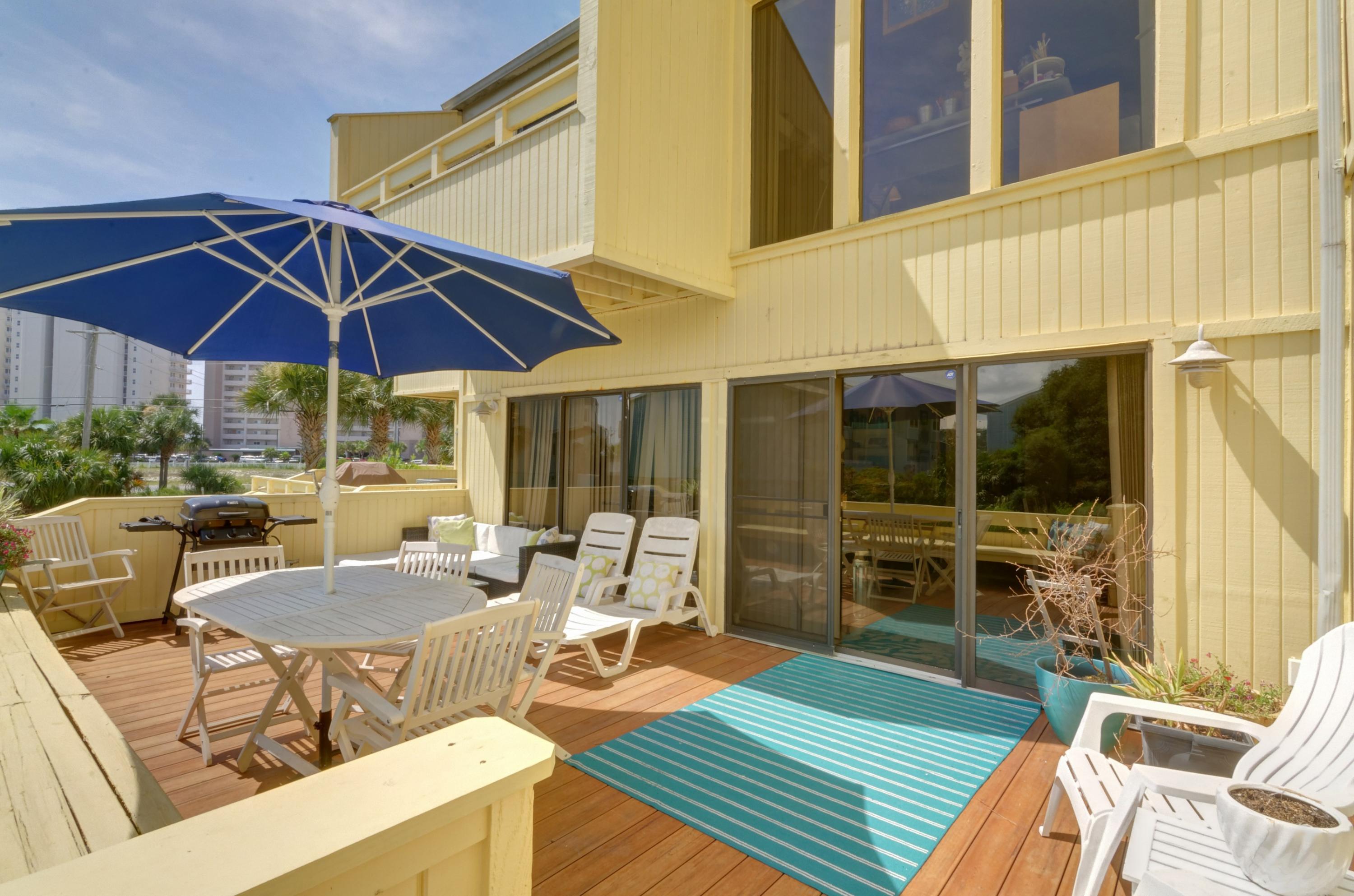 You've dreamed about it, now it's time to make it a reality and live the ''good life'' at Buena Vida on Navarre Beach! This spacious and recently updated townhome is perfect for you to live full time (VA financing approved!), or for the perfect second home/investment property with views of the intercoastal waterway. Bring your boat, this property comes with a 10x22 deep water boat slip! Downstairs you'll find a convenient oversized garage and a private bedroom with French doors leading to the downstairs 17x24 patio with plenty of room for all your must have beach gear. On the second floor is the open living/dining room with a stunning view from the 12x24 patio. Enjoy tile floors and seller upgrades like stainless appliances in the kitchen. Two more bedrooms are located on this level along with a recently updated bathroom featuring stunning double vanities and a convenient laundry room. Located on the top floor is the master oasis for maximum enjoyment and privacy. An entire floor featuring it's own living room or 11x19 bonus space to use how you want with lovely views facing the water and tennis courts! In the master bedroom you'll find soaring vaulted ceilings with more natural sunlight pouring through the glass doors. Enjoy waking up every morning to the view of the intercoastal where you can relax on your own private balcony to drink your morning coffee. The master also features an oversized walk in closet, matching double vanities, and two showers. All bedrooms feature new carpet. Buena Vida features tennis courts, a community pool, and boat docks that are currently undergoing a complete renovation project to be completed in 2 weeks (new docks, stairs and will have water, power, and a handicapped ramp). HOA fees include a termite bond and interior and exterior quarterly pest control. Enjoy the best the Emerald Coast and Navarre Beach has to offer at Buena Vida!