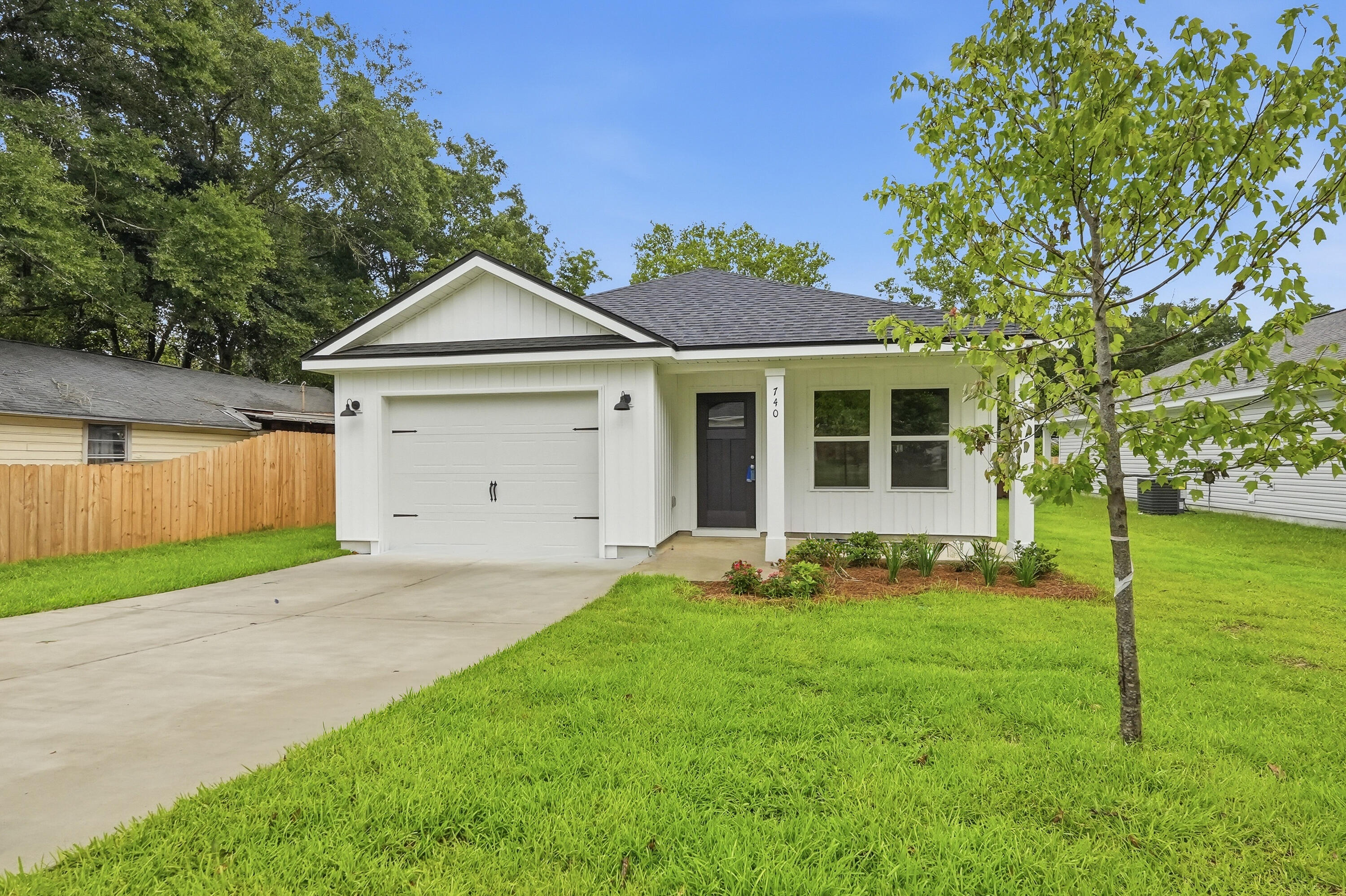 MID TOWN LOCATION - READY END OF MAY - The 'Scarlett' floor plan is SMALL BUT MIGHTY' big on features!   Front and rear porches for relaxing, fully landscaped yard, finished garage, luxury vinyl plank flooring throughout, recessed lighting and ceiling fans in all BR'S/Living Room.  Open family room/dining area/kitchen, work island with bar seating, walk-in pantry, quartz countertops.  Owner's bath has walk-in closet, double vanities, linen storage + shower only.  Seller will contribute up to $10,000 towards buyers closing costs/prepaids/rate buydown (call for details).