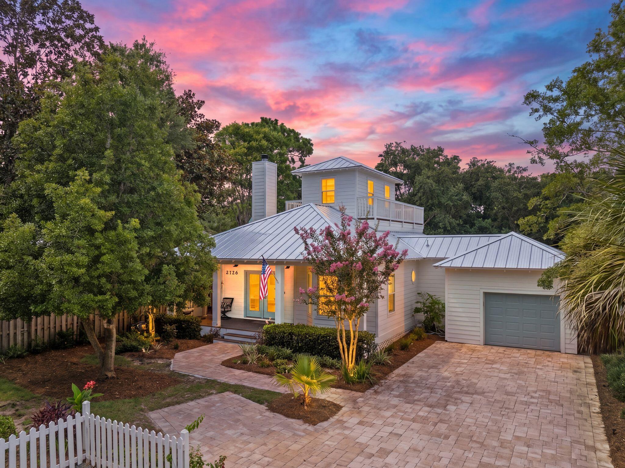 Your dream Sandestin property is waiting for you! Welcome to 2026 Schooner Cove, a rare three-bedroom, two-bath coastal retreat located in the highly sought-after Crystal Lake neighborhood, tucked behind the exclusive gates of Sandestin Golf and Beach Resort--one of the Emerald Coast's premier resort destinations.

Beautifully remodeled, renovated, and upgraded; this fully furnished residence offers the perfect blend of timeless coastal style, modern comfort, and effortless resort living. Located in one of Sandestin's desirable non-short-term-rental neighborhoods, Crystal Lake provides a peaceful residential setting while being just a golf cart ride away from the beach, marina, dining, shopping, golf, tennis, entertainment, and all the incredible amenities Sandestin has to offer.

From the moment you arrive, the charm of this home stands out. Positioned at the end of a quiet cul-de-sac, the property features beautiful curb appeal with lush landscaping, white picket fencing, and an inviting front porch, newly built exterior columns and stairs, and an oversized new paver driveway with dedicated golf cart parking and charging.

Inside, the open-concept living, kitchen, and dining areas were designed for both relaxation and entertaining. The stunning chef's kitchen showcases new Viking appliances, quartzite countertops, a spacious island, updated cabinetry, and elegant coastal finishes throughout. The dining area is filled with natural light from beautiful bay windows, while the living room features warm hardwood floors, a cozy fireplace, and access to a screened outdoor living space perfect for enjoying the Florida lifestyle year-round.

The first-floor primary suite provides comfort and convenience, while additional bedrooms offer the ideal space for family and guests. Every detail has been carefully considered with extensive updates throughout, including new tile flooring, renovated baths, quartzite countertops, new sinks and faucets, upgraded lighting and fans, fresh interior paint.

Major recent improvements include a new metal roof (May 2025), new Viking appliances with three-year warranty, new paver patio and driveway by Grand Pavers, new shower, new double-pane glass in existing windows, new upstairs balcony decking, new fixtures throughout, and numerous additional upgrades.

Offered fully furnished and complete with an electric six-seater golf cart, 2026 Schooner Cove is a true turnkey opportunity to experience the best of Sandestin living. With luxury updates, an exceptional location, in one of Florida's most beloved coastal communities, this Crystal Lake residence, 2126 Schooner, is ready to welcome you home.

New balcony deck surround will be stained prior to closing. Buyer to verify all information deemed important.