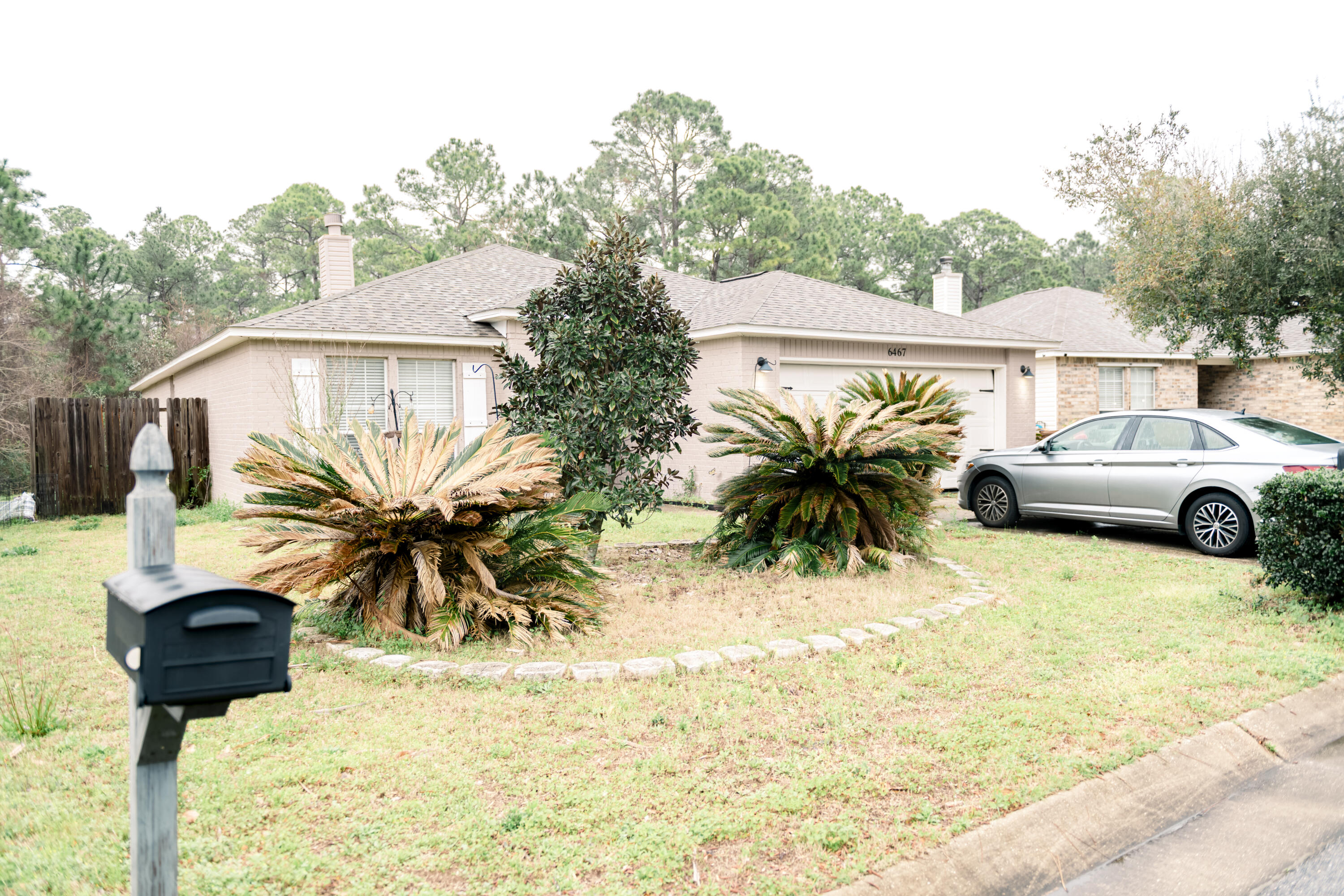 Welcome home to this 3-bedroom, 2-bath residence with a double-car garage offering a functional layout and solid structure with several key improvements already completed. Major updates include a 2020 roof, HVAC system, and new flooring installed in December 2024. Solar panels are installed and currently active, providing energy efficiency; the system is not fully owned and may be subject to buyer review and verification as part of due diligence.
Inside, the home features an open floor plan with vaulted ceilings in the living room, creating a central gathering space. The kitchen includes a breakfast bar, painted cabinetry, quartz countertops, and a dining area that connects to the main living space. The primary suite offers a private bathroom with a custom tile shower, garden tub, walk-in closet, and quartz finishes.
The property reflects a mix of updates and original condition, offering an opportunity for additional repairs, finishing work, and personalization throughout. Some areas may require attention, making it suitable for buyers seeking a property with improvement potential. The home is being sold in its current condition. Buyers are encouraged to independently verify all systems, finishes, exterior areas, and the solar installation as part of their due diligence.