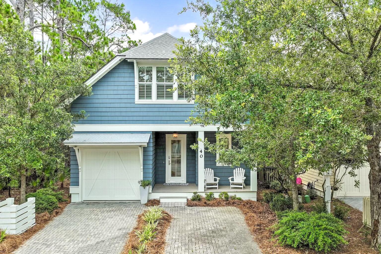 Rare opportunity to own the largest cottage style home in Watersound West Beach!  This beautifully designed custom home has a quaint feel yet boasts 2705 square feet with three master suites plus bunk room and features an open and spacious living/dining/kitchen area that overlooks a lovely screened porch and preserve area.  The kitchen is a cook's dream and features a gas stove top in the large island, upgraded cabinetry to the ceiling, beautiful quartz counters, stainless Kitchenaid appliances, and farm sink.  The living and dining areas feature shiplap, lovely white custom roman shades, and beautiful wood floors which also flow throughout the rest of the home.  Just down the hall is a powder bath, laundry, and the first floor primary suite featuring an upscale bath and two walk-in closets.  The spacious screened porch overlooks preserve area and the community boardwalk which meanders through a wooded area and along Deer Lake State Park and leads to the community pool and the beach. Upstairs, there are two spacious primary suites with large walk-in closets and gorgeous baths. In between the two bedrooms there is a wonderful bunk room with two sets of custom built-in bunks and and custom rustic ''barn'' doors. Adjacent to the bunk room there is a sitting room with TV that is perfect for a kids hangout. There is also a closet for the kids and their very own bath with tub/shower combo. This beautiful home has never been rented and is being offered fully furnished. The garage, insulated storage room, and multiple walk-in closets provide ample storage. The location at the end of the street affords privacy as there is wooded preserve area to the side of the home and no thru traffic. The boardwalk to the beach is just outside your back door!

Watersound West Beach features a community pool/clubhouse, putting green, boardwalks and trails, green spaces and parks, boardwalk to the beach, manned security gate, high speed fiber optic internet, and fitness center at Watersound Beach. The beach access through Deer Lake State Park is a perpetual easement so no customary use worries here! And no crowds! The privacy, security, scenic beauty, and exclusive beach access makes Watersound West Beach the premier neighborhood on 30a for full time residency or second home ownership.