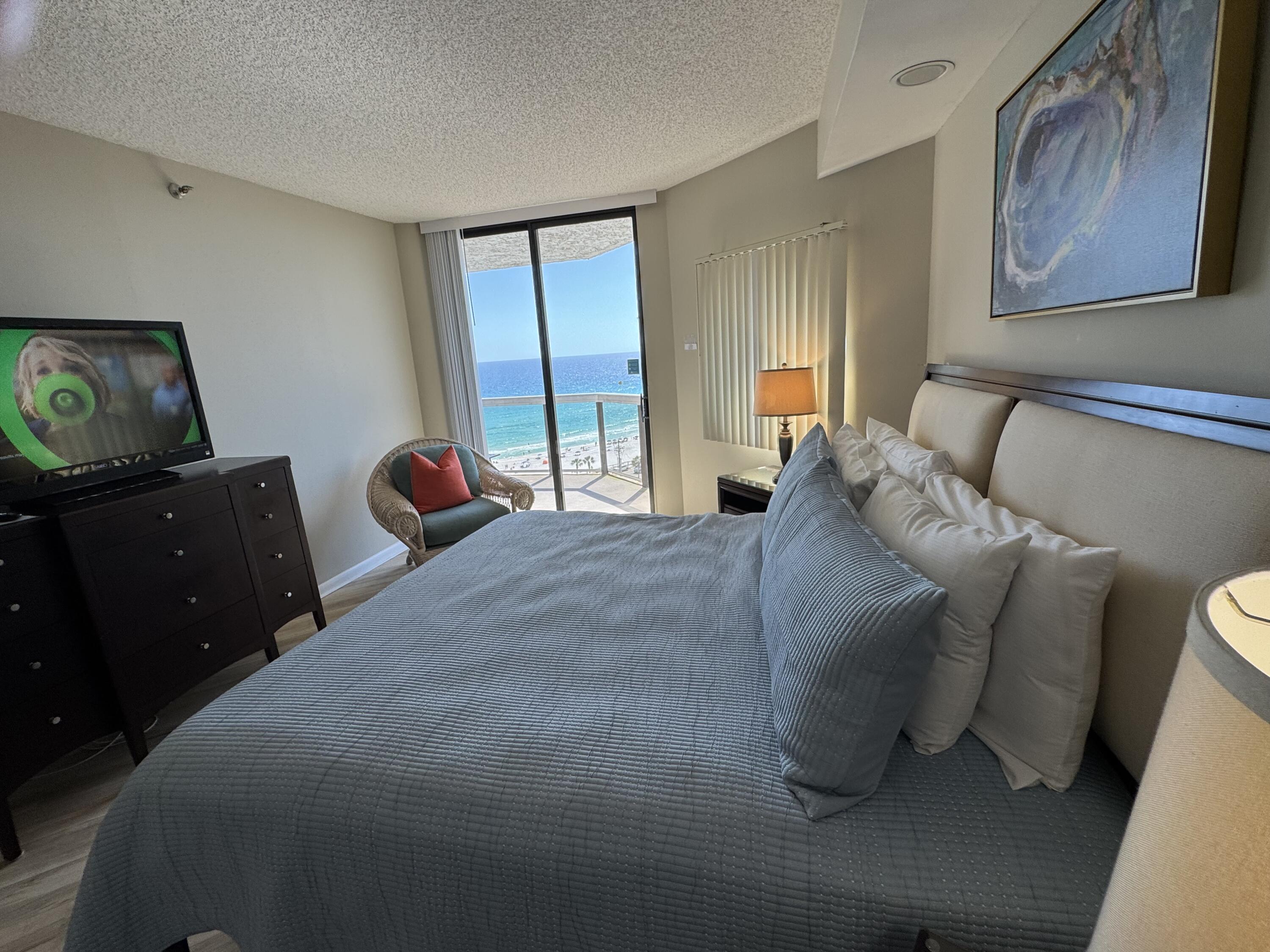 Surfside beachside resort living at its best. Rare 2BR/2BA floor plan featuring a lockout guest suite with private entrance--ideal for rental income or guest privacy. Renovated and turnkey, ready for immediate occupancy or short-term rental.
Enjoy Gulf views from the primary bedroom and relax on the oversized patio with access from both bedrooms, living, and dining areas.
Resort-style amenities include pool, 2 hot tubs, large sun deck, tennis, basketball, shuffleboard, fitness center, outdoor cooking area, bar, covered parking, and conference room. On-site spa/salon and restaurant. Directly across from the Gulf with convenient covered skywalk for easy beach access. Prime location near shopping, grocery stores, outlet malls, dining, and entertainment.