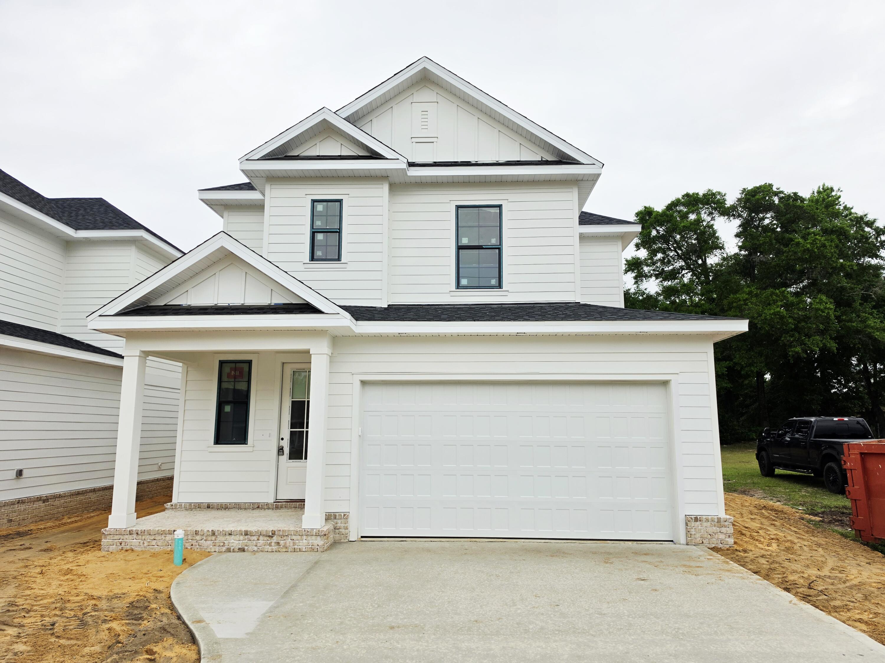 Seller offers $8,000 any dollars for buyer to use towards closing expenses.
Brand new build to be completed at the end of May 2026. Modern comfort meets thoughtful design and a location that keeps you close to everything that Valparaiso, Niceville, and its surrounding areas have to offer. This beautifully crafted 4-bedroom, 2.5-bath residence offers 1,992 square feet of well-planned living space perfect for both everyday living and entertaining.
Inside enjoy a bright, open-concept layout with seamless flow between the living, dining, and kitchen areas, and the half bath on the first floor. The first floor is where the main suite is located, offering convenience and comfort with double vanity bath and oversized walk-in closet. Upstairs, you will find the three additional bedrooms and a full bath, creating a little separation from the main suite and the rest of the home.
Outside, enjoy a fully fenced backyard. The 2-car garage provides ample storage and parking, while the brand-new construction offers peace of mind with modern materials and finishes throughout.
Located just 1 mile to Eglin Air Force Base, and 3 miles to the shopping and dining of Niceville, this home combines the best of new construction with a prime location.