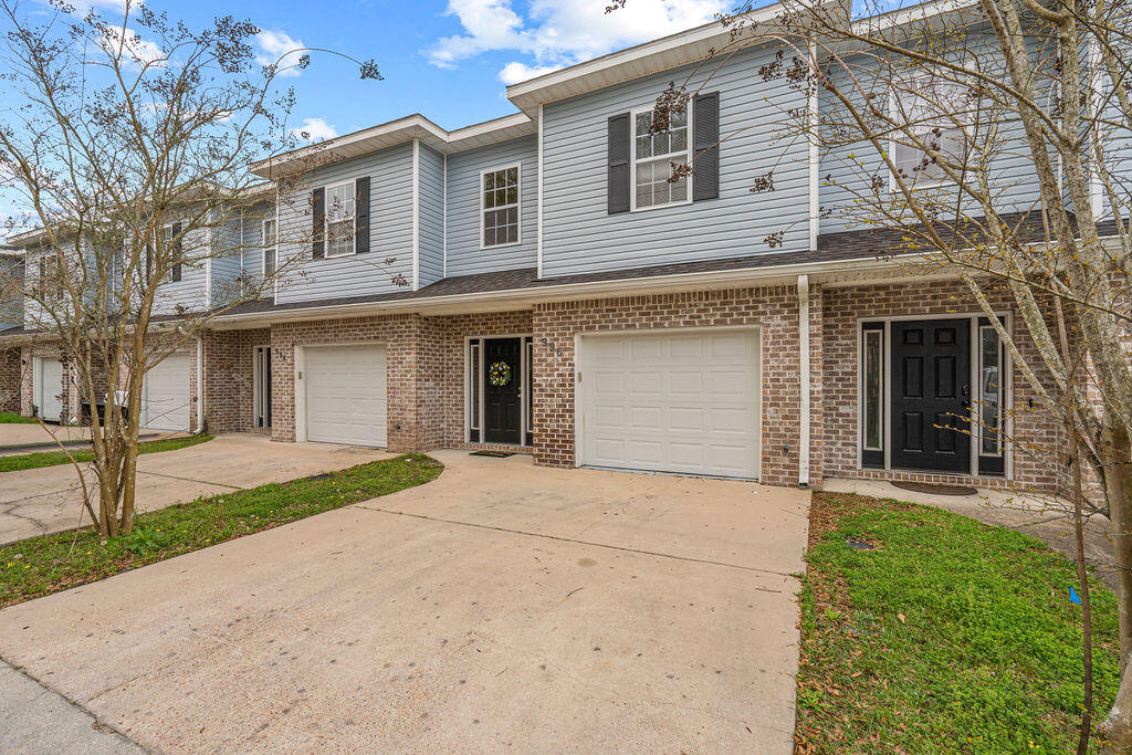 Welcome home to this beautifully cared-for 4-bedroom, 2.5-bath townhome offering the perfect blend of comfort, convenience, and low-maintenance living in an unbeatable location. From the moment you step inside, you'll appreciate the bright, open-concept layout and soaring ceilings that create an airy, welcoming atmosphere ideal for both everyday living and entertaining.

The spacious kitchen features stainless steel appliances and flows effortlessly into the living and dining areas, making it easy to stay connected while hosting family and friends. Generous bedroom sizes and ample closet space provide room for everyone to relax and stay organized.

Step outside to your own cozy, fully fenced backyard -- the perfect spot for morning coffee, weekend barbecues, or winding down after a long day. A 1-car garage and move-in ready condition make settling into your new home simple and stress-free.

Enjoy the benefits of low HOA fees and a lifestyle designed for ease and convenience. Ideally located just minutes from downtown Fort Walton Beach, this home offers quick access to Hurlburt Field, Eglin Air Force Base, and the stunning white-sand beaches, shopping, and dining of Destin.

Whether you're searching for a primary residence, an easy-to-maintain home, or a smart investment opportunity, this property checks all the boxes with proven long-term rental potential and thoughtful updates throughout. Added bonuses include:
" Seller offering $5,000 toward buyer closing costs
" HVAC replaced in 2025
" Water heater replaced in 2024
" Carpet replaced in 2024

This charming townhome is ready to welcome its next owner -- come see all it has to offer!