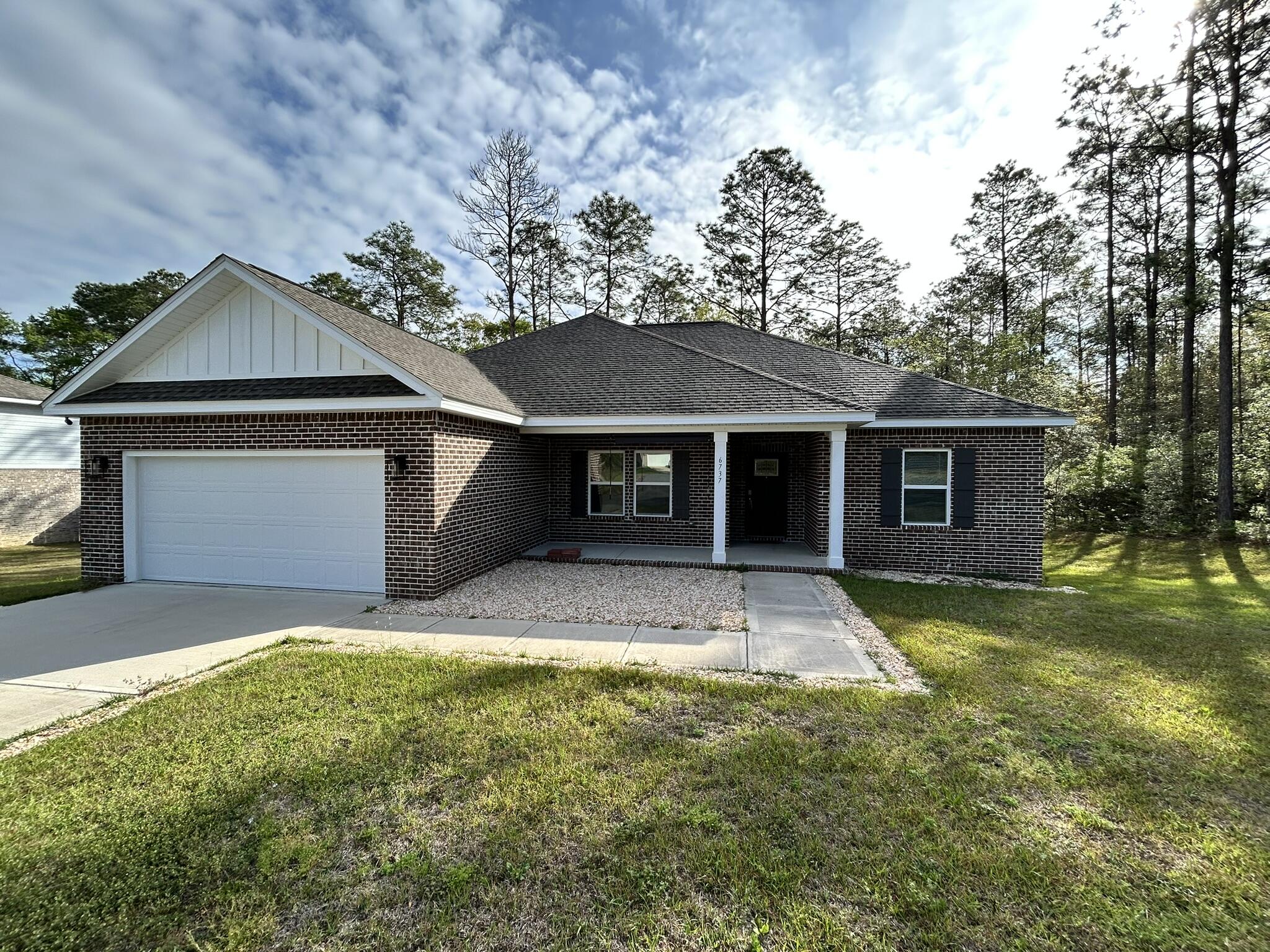 Looking for a rental that truly has it all? This stunning 4BR/2BA brick home, built in 2023, is located less than 10 minutes from North Crestview and sits on a generous .55-acre lot. With its welcoming covered front porch and bright, open-concept living area, this home is designed for both relaxation and easy entertaining.

The split-bedroom layout provides a private primary suite, while three additional bedrooms offer flexibility for family, guests, or a home office. Out back, enjoy a covered porch and a serene backyard perfect for unwinding or hosting weekend gatherings. Residents also have access to neighborhood amenities like sidewalks, walking trails, and a large community pool. Comfortable, modern, and conveniently located this is a rental you won't want to miss.