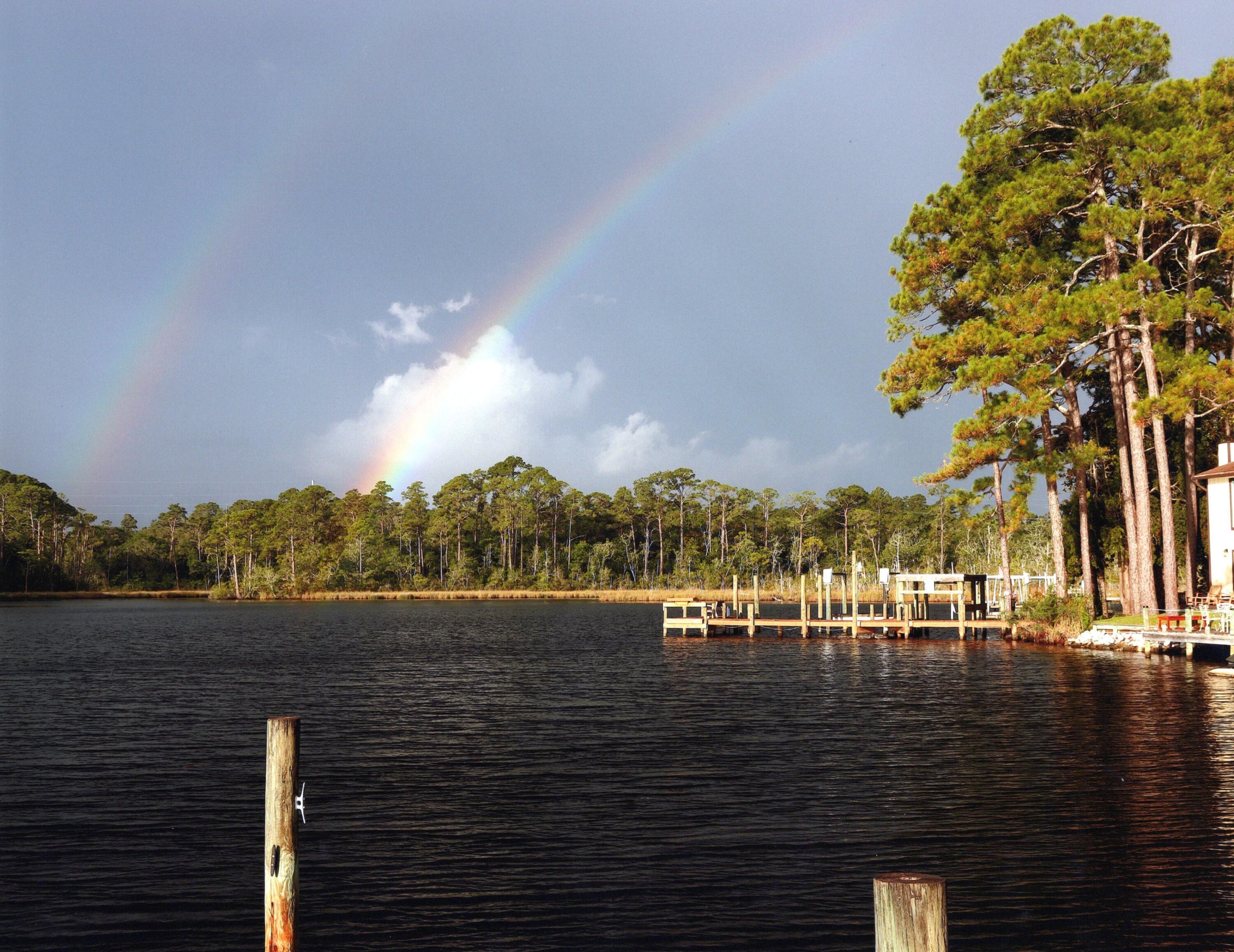 Welcome to your new waterfront community where boating, fishing and water sports are just outside your back door. Live only minutes from Eglin AFB in this sought after community with a waterfront community pool, clubhouse, workout room and a community boat dock (leased slips available). This property sits on Tom's Bayou which is a short boat ride to Destin's Crab Island. This open, and airy home offers gorgeous bayou views from the back porch. Downstairs features include a master suite with a full bathroom, a walk in closet and an additional half bathroom. Open kitchen and beautiful vaulted ceilings with a fireplace and double doors for gorgeous view of the water are key features as well. Upstairs presents a spacious loft for work or play, two bedrooms and a full bathroom. New roof and high impact windows were installed in 2024. All new carpet was just installed in the bedrooms and on the stairs in April. This home is a one of a kind in this area and with the beautiful water right outside your back door, you will enjoy the beauty of Tom's Bayou every day, ideal as a primary residence or a high-demand rental.

Come see it today!