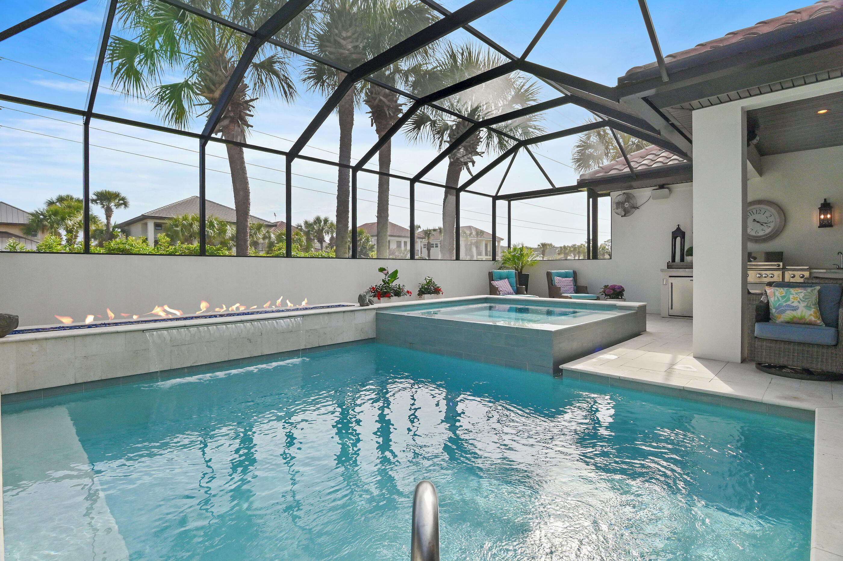 UNDER CONTRACT WITH A 72 HOUR KICK OUT CLAUSE. Welcome to 4765 Papaya Park offering the ultimate in outdoor living in the exclusive gated community of Destiny East.  Meticulously maintained as a primary residence, this one-story home is move-in or rental ready, being offered fully furnished and beautifully decorated.  The screened courtyard is the ultimate in outdoor living with an outdoor kitchen/dining area, living area and wonderfully updated pool and spa. Enjoy the  world class amenities including a large club house with a theater, party room, kitchen, and gym. The two lighted tennis courts are also lined for pickle ball. The large pool and hot tub are next to the wonderful children's play ground.  
Located just moments away from the pristine beaches and sparkling gulf waters, this beach house offers the ultimate coastal lifestyle.
Enjoy the convenience of nearby amenities, including upscale dining, boutique shopping, and recreational activities. With its prime location and unparalleled beauty, this glamorous beach house is an extraordinary opportunity to live a life of coastal luxury. Don't miss your chance to experience the epitome of refined living by making this exquisite residence your own.