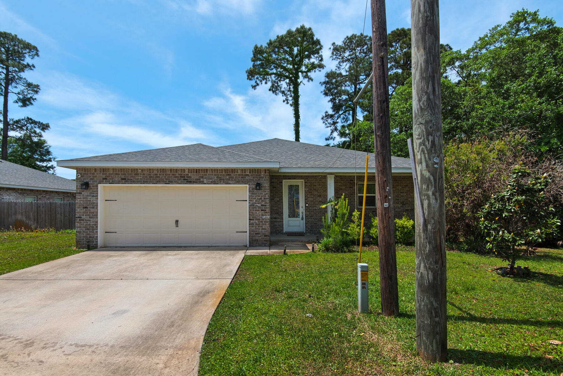 Enjoy modern living in this open-concept home featuring a spacious kitchen with stainless steel appliances and a convenient breakfast bar. The master suite offers double sinks, quartz vanity tops, a tiled walk-in shower, and a relaxing soaking tub. The fully fenced backyard and covered back porch are perfect for entertaining. Ideally located just 9 miles from Navarre Beach and 15 minutes from downtown Fort Walton Beach, with easy access to Hurlburt Field and Eglin AFB. With an approved pet application, owner will allow fully grown dogs or cats up to 75 lbs or less with a $350 non-refundable pet fee for each pet and $10 per month for each pet. Residents are enrolled in the Coastal Realty Services Resident Benefits Package (RBP), which includes renters insurance, HVAC air filter delivery, a resident rewards program, and more!