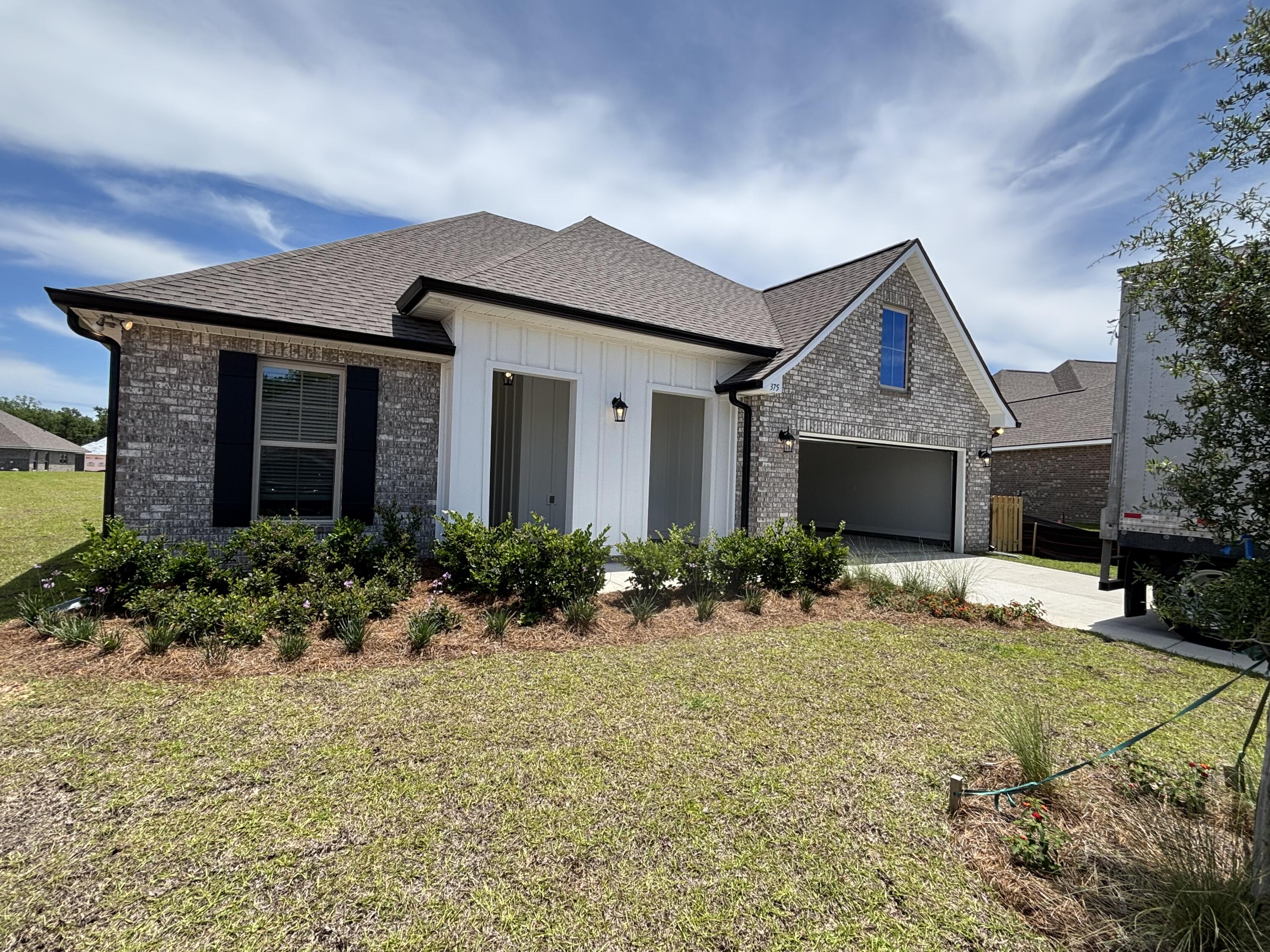 The HICKORY III G in Bird Song at Hammock Bay community offers a 5BR/3BA, open design with formal dining room and separate den. Upgrades added (list attached). Features: double vanity, garden tub, separate custom tiled shower, and walk-in closet in master bath, kitchen island, walk-in pantry, covered porches, boot bench, crown molding, recessed lighting, framed mirrors, smart connect WIFI thermostat, smoke/carbon monoxide detectors, landscaping package, architectural 30-year shingles, flood lights, and more!
Energy Efficient Features: water heater, kitchen appliance package, vinyl low E windows, and more! Energy Star Partner.
