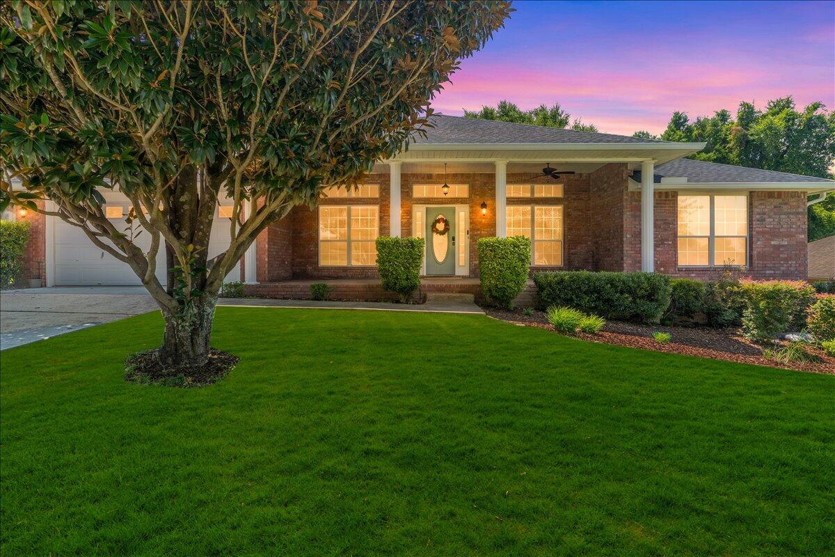 Welcome home to this inviting 4-bedroom, 3-bathroom home offering space, comfort, and thoughtful updates throughout! Step inside to soaring ceilings and a spacious living room with a cozy fireplace, perfect for gathering with family and friends.

The flexible floor plan features a formal dining room and a bonus room that can easily serve as a home office, homeschool space, playroom, or craft room.

Recent updates include fresh interior paint, updated lighting, brand-new carpet, and beautifully refinished concrete flooring. The kitchen offers a center island, decorative concrete countertops, and a stainless steel appliance package, including a refrigerator, glass-top freestanding electric range, and dishwasher.

The spacious primary suite features a private ensuite bathroom, creating a relaxing retreat at the end of the day.

Outside, enjoy a large, fenced backyard with mature shade trees--ideal for entertaining, play, pets, or simply relaxing outdoors.

Conveniently located with an easy commute to Eglin Air Force Base and Hurlburt Field, you'll also be close to shopping, dining, schools, and everyday conveniences.

With versatile living spaces, stylish updates, and plenty of room to enjoy inside and out, this move-in-ready home is ready to welcome its next owners. Schedule your showing today!

Major Systems: HVAC (2026), Water Heater (2024), Roof (2021) Conveniently located south of I-10, this home offers an easy commute to Eglin Air Force Base and Hurlburt Field while keeping you close to shopping, dining, schools, and everyday conveniences.

With generous living spaces, stylish updates, and a backyard made for making memories, this home is ready to welcome its next owners. Come see all it has to offer!

Major Systems: HVAC (2026), Water Heater (2024), Roof (2021)