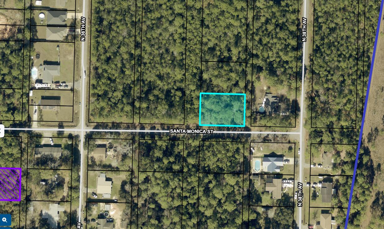 .321 acres . Corner lot. Zoned R1 ... NO manufactured homes.  Per the county the parcel can be split to the original platted lots.  It must put it back to the 50'x140' lots, not facing Santa Monica. If split facing Santa Monica must meet the current code with 70' of road frontage and be ¼  / .25 acre in size which can not meet the size requirements. Will need an access agreement with the Public Works/Road & Bridge Dept.  It would be up to the owner to clear the access. Wetland Study is needed before any development, not in flood zone (X)