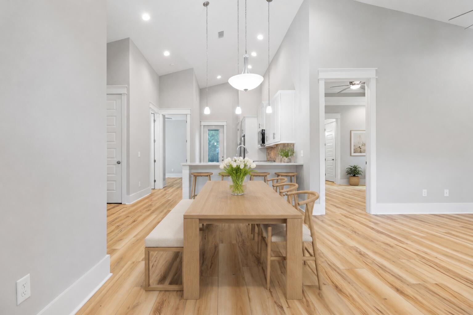 This beautifully finished 3 bed, 2.5 bath home offers 1,398 sqft of stylish comfort just 10 minutes from the beach! Featuring LVP flooring, tile showers, shiplap accents, vaulted and trey ceilings, crown molding, and a fenced backyard -- all with no HOA. Prime location near the bay and the future Chat Holley park & amphitheatre makes it perfect as a full-time home or a high-performing rental! Construction complete as of 9/1/2025! Seller will install a wood privacy fence with an acceptable offer. Watch the Youtube video here: https://www.youtube.com/watch?v=KK6thdyELSs