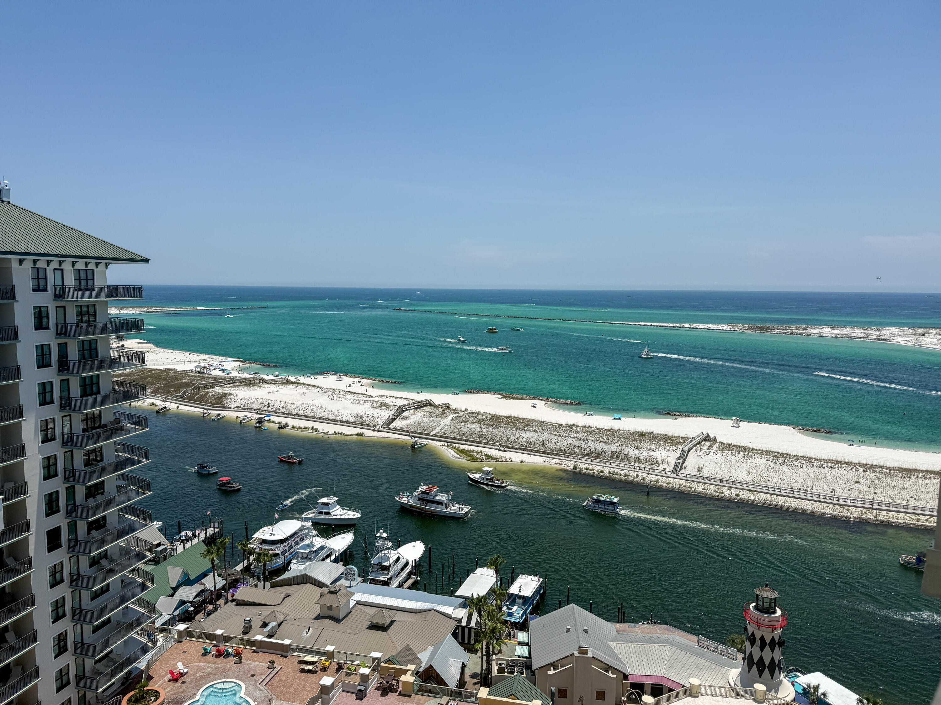 Experience coastal luxury from the penthouse level  2-bedroom plus bunk room, 2-bath condo at Emerald Grande at HarborWalk Village. Perfectly positioned to capture breathtaking views of Destin Harbor, East Pass, and the Gulf of Mexico, this beautifully appointed residence offers two private balconies where you can enjoy sunrises, sunsets, and the constant activity on the water.

Designed with both comfort and investment potential in mind, the open-concept floor plan provides space for family and guests, while the additional bunk room maximizes sleeping accommodations for vacation rentals. Sold fully furnished and rental ready, this condo allows you to begin enjoying or renting the property immediately.

Emerald Grande is one of Destin's premier waterfront resorts, offering an unmatched lifestyle with resort-style amenities including outdoor pool, hot tubs, a fitness center, full-service spa, concierge services, on-site dining, and beach access. Located within HarborWalk Village, you'll have immediate access to waterfront restaurants, shopping, entertainment, fishing charters, watersports, seasonal events, and vibrant nightlife. 

Whether you're searching for a luxurious second home or a vacation rental investment, this exceptional penthouse-level condo offers the perfect combination of location, amenities, and spectacular views. Don't miss this opportunity to own your piece of paradise in the heart of Destin.