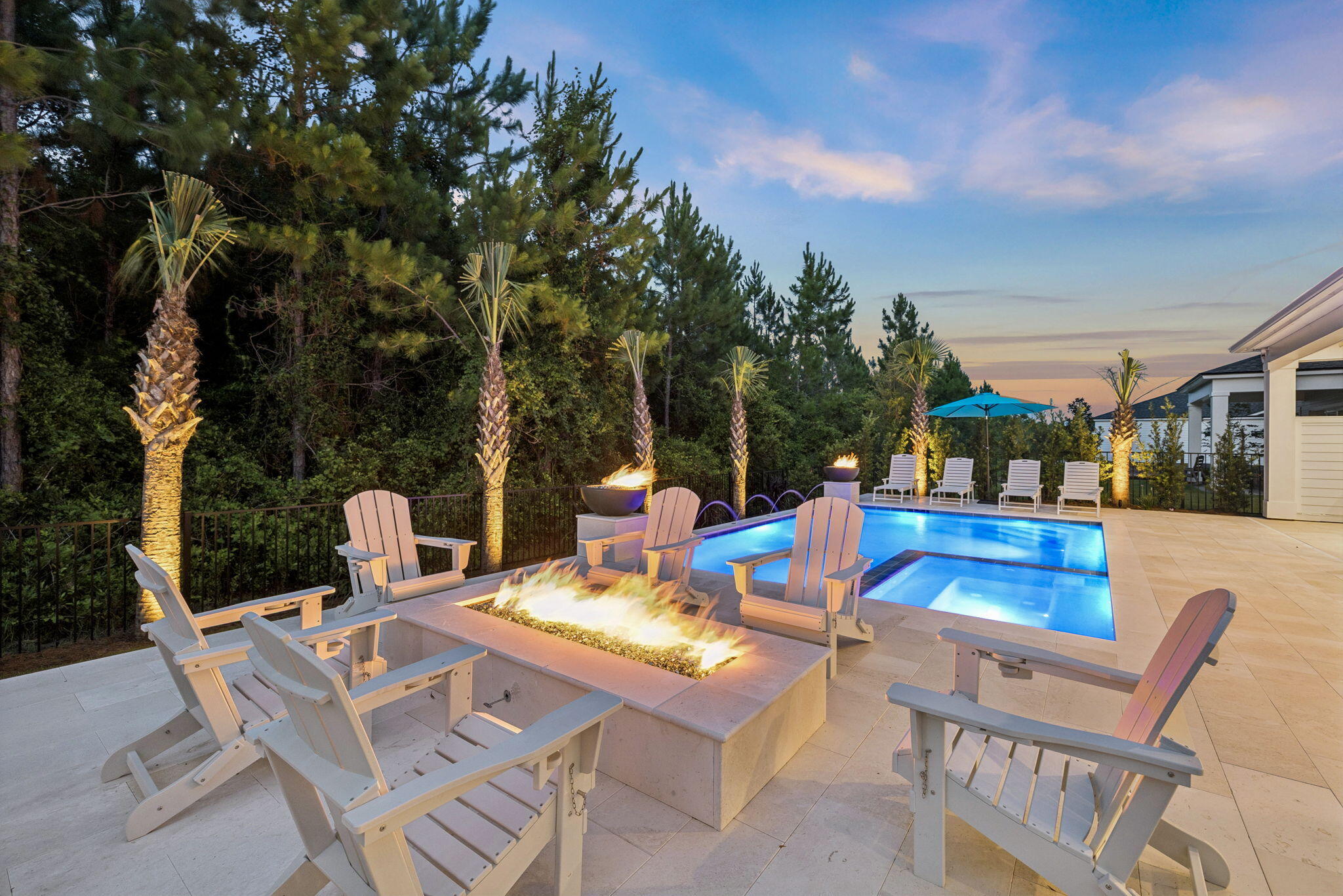 The most upgraded home to ever hit the market in Breakwater at Ward Creek. This 4-bedroom, 3.5-bath, 3,065 sq ft residence on a preserve-backing homesite has been finished years ahead of the standing inventory, with a level of detail that shows better than the model homes. Step into a two-story foyer with 20-foot ceilings, custom beam work, added window and door casing throughout, and a glass-enclosed wine cellar built under the stairs as an architectural feature. 

The kitchen carries KitchenAid appliances, a Thor cooktop, a custom wood vent hood with a top-tier exhaust system, marble counters that replaced all original quartz throughout the home, cabinet toppers, glass bar cabinetry, slide-out drawer systems, and full under- and in-cabinet lighting. The pantry was rebuilt into the largest available in a Toll Brothers floor plan, with custom shelving, marble counter, and a second LG refrigerator. 

Solid wood cabinetry was added in the mudroom, laundry, and primary bath, with new tile backsplashes, a shiplap accent wall, and gold fixtures and hardware carried through the home. Every closet is a custom build-out with drawers and shelving and dedicated lighting. 

The primary suite includes wireless motorized shades and a new dual shower with high-end tile and a custom waterfall design. Behind the home, a full front-and-back makeover delivers a saltwater pool and spa, fire pit with fire bowls, outdoor TV, landscape lighting, all backing to HOA preserve so the view stays yours. A four-zone security camera system, whole-home WiFi coverage, custom tongue-and-groove porch ceilings, a fresh top-to-bottom interior repaint, and a three-car tandem garage with significant storage complete the home. This is not a project. It is move-in-ready luxury with nothing left to decide. Furniture negotiable.

Breakwater at Ward Creek is a gated community in one of Panama City Beach's strongest growth corridors. Its brand-new clubhouse just opened, with a fitness center, indoor and outdoor living spaces, a zero-entry pool with sun shelf and lap lane, cabana seating, a playground, tennis and pickleball courts, and a large outdoor green space. Nearby, the West Bay Town Center is bringing a new Publix and shopping, a new FSU Health hospital is underway, and a new Intracoastal marina is planned.