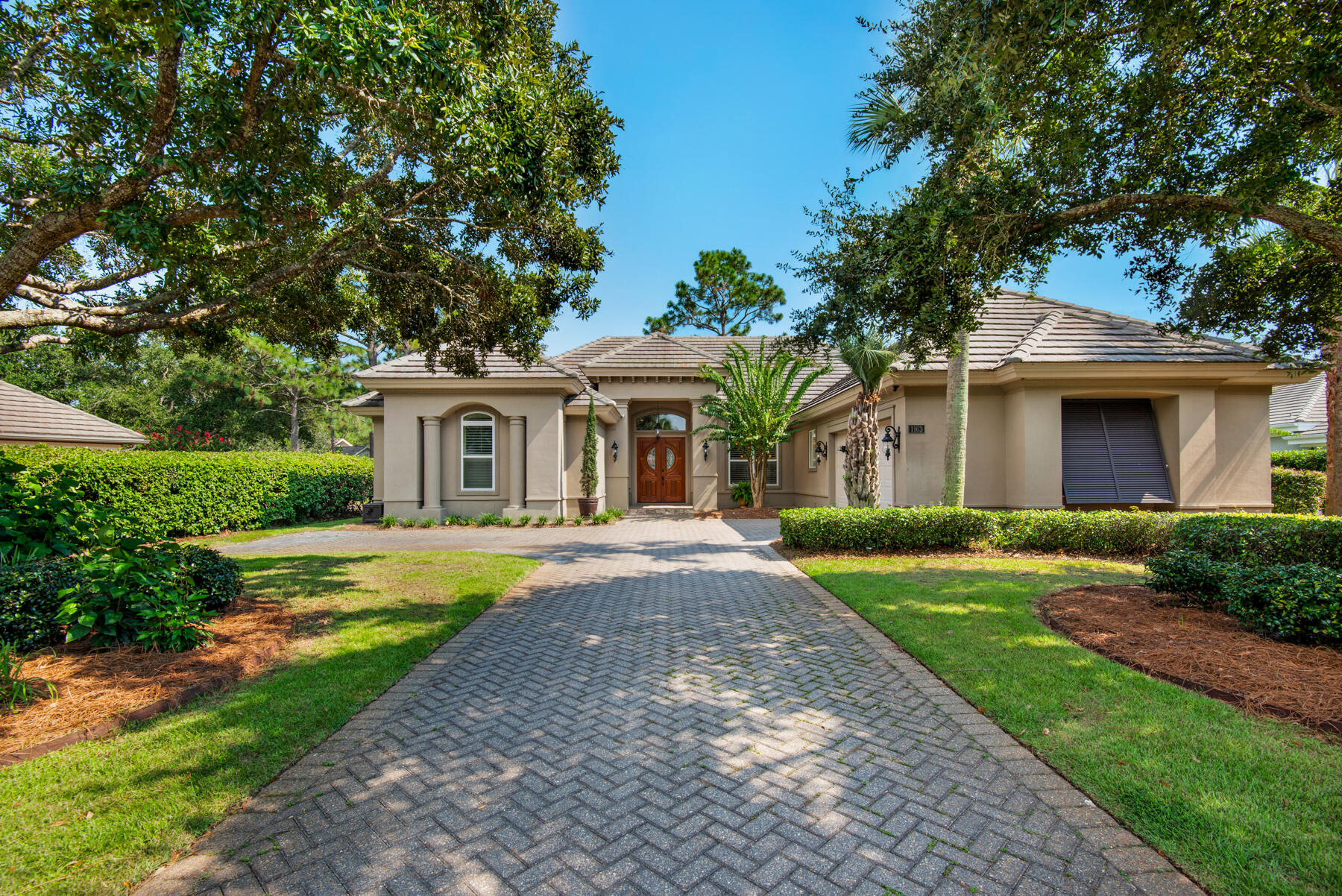 Original owners. Custom home by Boswell Builders-many upgrades. Large open chef's kitchen with 6 burner Dacor gas cooktop, all appliances built in-stainless steel or cabinet front, deep stainless steel sink overlooking pool and spa, veg sink in island, large walk in pantry,  wine cooler. Separate wine bar with ice maker. High ceilings thruout 10-12', crown molding in all rooms, 8' solid doors. 3 sets of french doors leading to pool/spa. Gas fireplace with electric wall switch. Plantation shutters. Lots of extra storage. Primary has his & her walk in closets, his & her vanities with skylight above each, walk in shower with steam. Guest bath is jack and jill with luxury Kohler walk in tub spa/shower. Heated pool and spa-new pool equipment,. Outdoor gas grill plus 2 side gas burners, sink. 2 car garage with built in cabinets. floored attic storage with pull down stairs. 4 seater E-Z golf cart conveys. Hurricane shutters. New home  insurance policy May 2026 $5995 (down $683 from 2025). No short term rentals.