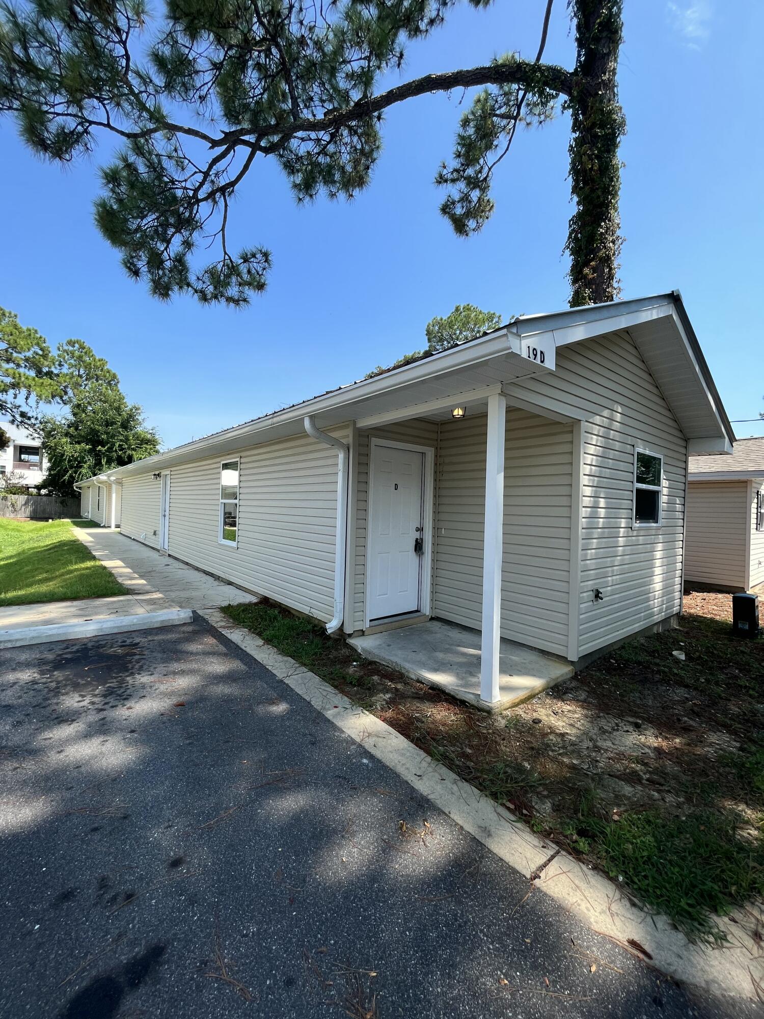 This adorable duplex was built in 2018. It has a contemporary look that is hard to come by. The open floorplan gives a spacious feel.  Washer/dryer connections in unit. Very close to downtown Fort Walton Beach and the beaches.

**Photo of the bathroom is of an identical unit (D), this unit has a walk in shower (no tub).
