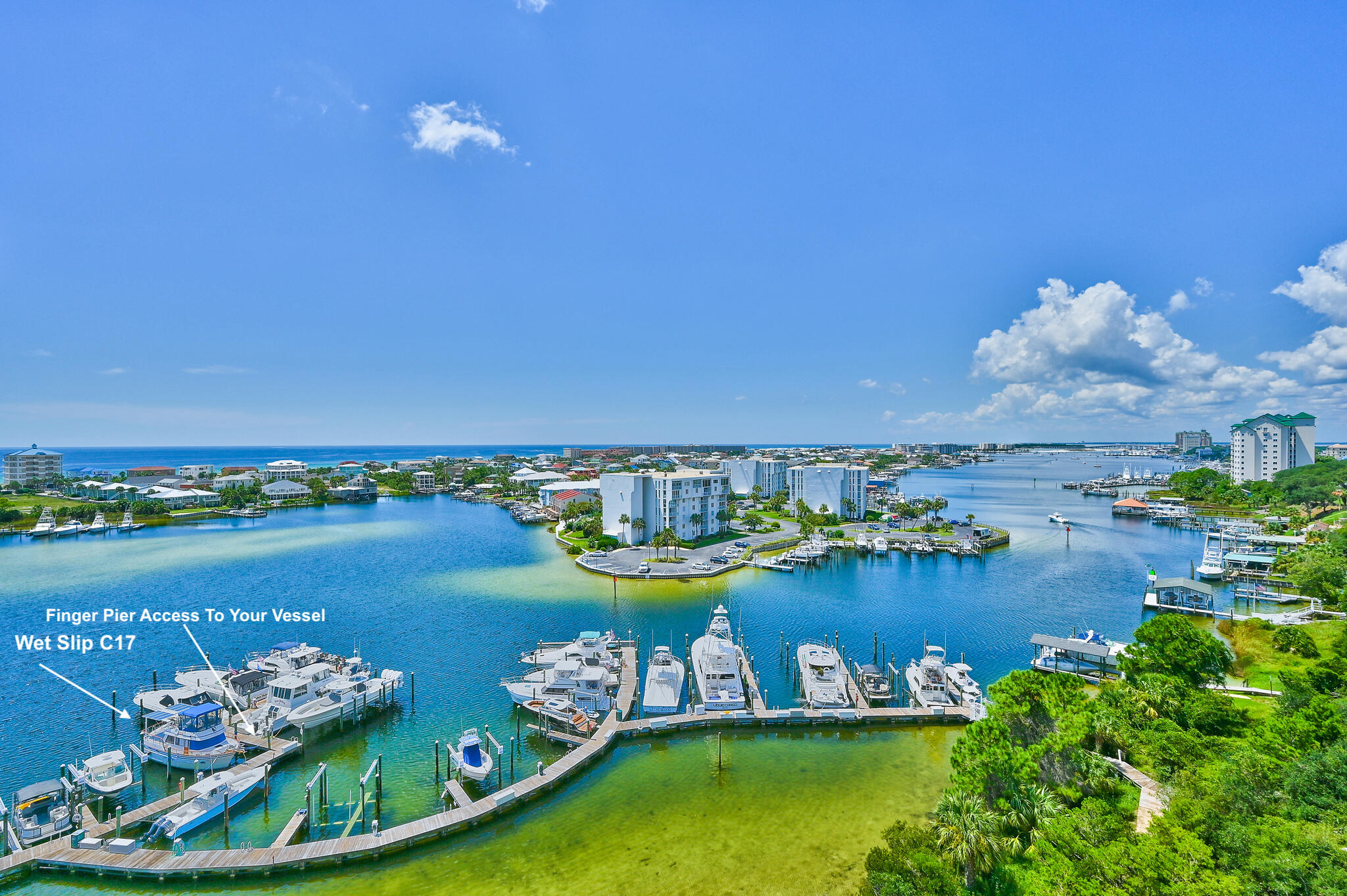 40x15 wet slip on the beautiful Destin Harbor in Marbella Yacht Club. Prime location in the Marina with access to your vessel via finger pier.  Monthly Yacht Club Dues do not cover electricity usage from shore power. Slip will convey via Assignment of Use. Buyer to pay 6% Florida Sales Transfer fee to DEP  at closing. Marina is professionally managed. HOA fees $260/month.   Buyer to verify all dimensions and dues.
