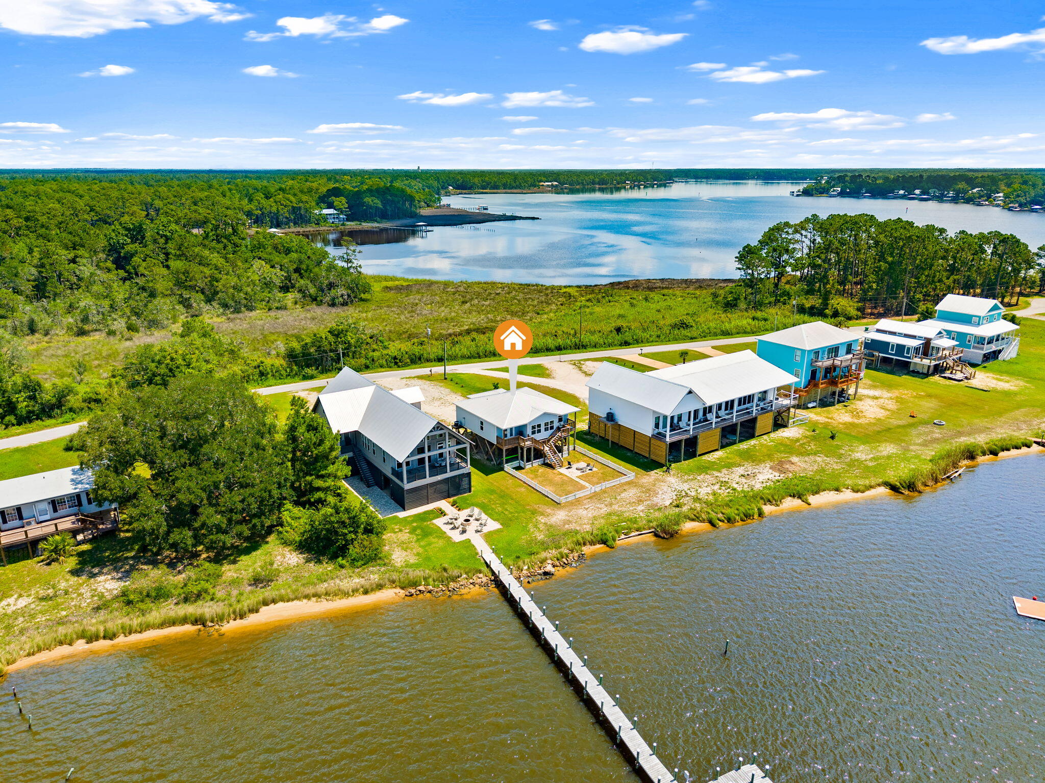 Available Now - Waterfront Living at 486 Beatrice Point Road, Freeport
Experience some of the most beautiful waterfront views in Freeport from this unique bayfront home located on highly desirable Beatrice Point Road. Perfectly positioned between Choctawhatchee Bay and LaGrange Bayou, you'll enjoy stunning water views from both the front and back of the property, along with breathtaking sunset views right from your living room.
This partially furnished home offers 3 bedrooms and 2 bathrooms with a thoughtfully designed layout centered around a beautiful chef's kitchen--the perfect gathering space for family and friends. Large windows fill the home with natural light while showcasing the incredible waterfront scenery.
Property Features:

3 Bedrooms | 2 Bathrooms
Partially furnished
Chef's kitchen with ample space for entertaining
Expansive windows with panoramic water views
Bayfront backyard with fire pit
Covered storage area beneath the home
Plenty of room to park your boat
No HOA restrictions
Enjoy the peaceful waterfront lifestyle while remaining conveniently close to everything the Emerald Coast has to offer. Beatrice Point Road is known for its quiet setting, waterfront homes, and easy access to boating, fishing, and paddleboarding. Location Highlights:

Approximately 10 minutes to Freeport Marina and public boat launches
About 15 minutes to Interstate 10
Approximately 25-30 minutes to the beaches, dining, and shopping of 30A
Convenient access to Destin, Niceville, and the surrounding Emerald Coast communities
Relax by the waterfront fire pit, launch your boat for a day on the bay, or simply enjoy spectacular sunsets from your own backyard.

Important: This property is listed by a management company for acquisition and marketing purposes. During the tenancy, tenants will work directly with the property owner for rent payments and ongoing management.

Don't miss this rare opportunity to lease a waterfront home with incredible views, boating convenience, and some of the best sunsets on the Emerald Coast.