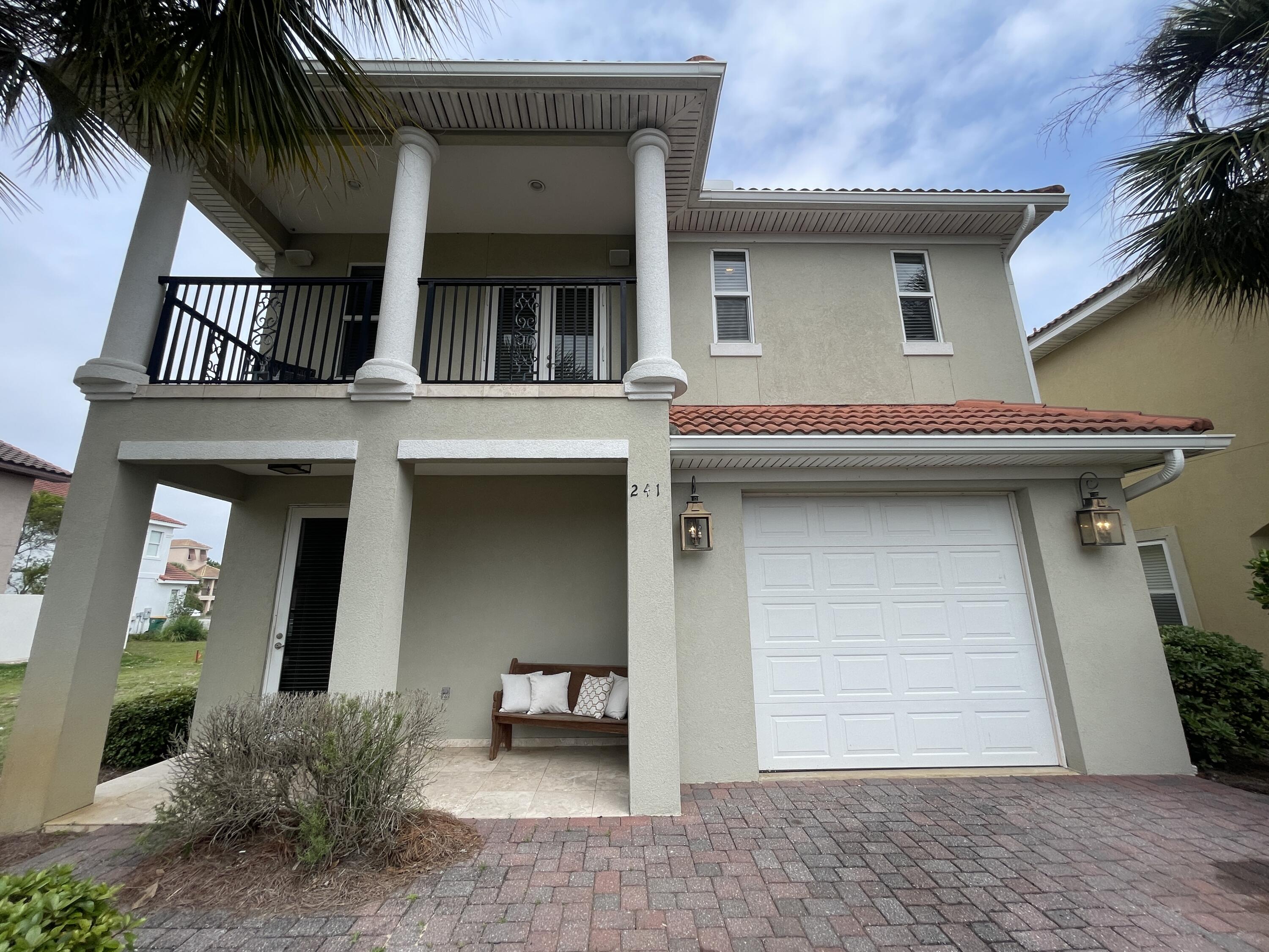 Experience elevated coastal living in this exquisite Mediterranean-style residence located within the highly sought-after gated community of Calusa Bay in Destin. Perfectly positioned just moments from the area's famous sugar-white beaches and emerald Gulf waters, this luxurious 3-bedroom, 3.5-bath home offers the ideal blend of elegance, comfort, and convenience.

Beautifully designed with timeless finishes and thoughtful details throughout, the home welcomes you with soaring ceilings, crown molding, travertine flooring, and a spacious open-concept layout perfect for both relaxing and entertaining. The gourmet kitchen is a true centerpiece, featuring custom cabinetry, granite countertops, stainless steel appliances, and generous prep and storage space that seamlessly connects to the expansive living and dining areas.

Upstairs, the stunning primary suite serves as a private retreat complete with its own balcony overlooking the beautifully maintained community surroundings. The spa-inspired ensuite bathroom offers dual vanities, a spacious walk-in shower, and refined finishes throughout. The additional guest bedrooms are thoughtfully designed for privacy and comfort, including one bedroom with its own private ensuite bath, while the third bedroom enjoys access to a full guest bathroom.

Residents of Calusa Bay enjoy resort-style amenities including a sparkling community pool and beautifully landscaped grounds, creating a peaceful and upscale atmosphere  just minutes from shopping, dining, entertainment, and Destin's world-renowned beaches.

Well-behaved pets may be considered with prior owner approval, a non-refundable pet fee, and monthly pet rent. Smoking and vaping are not permitted inside the home.

This exceptional property offers the perfect opportunity to enjoy the luxury and tranquility of the Emerald Coast lifestyle -- where every day feels like a vacation. Welcome home.