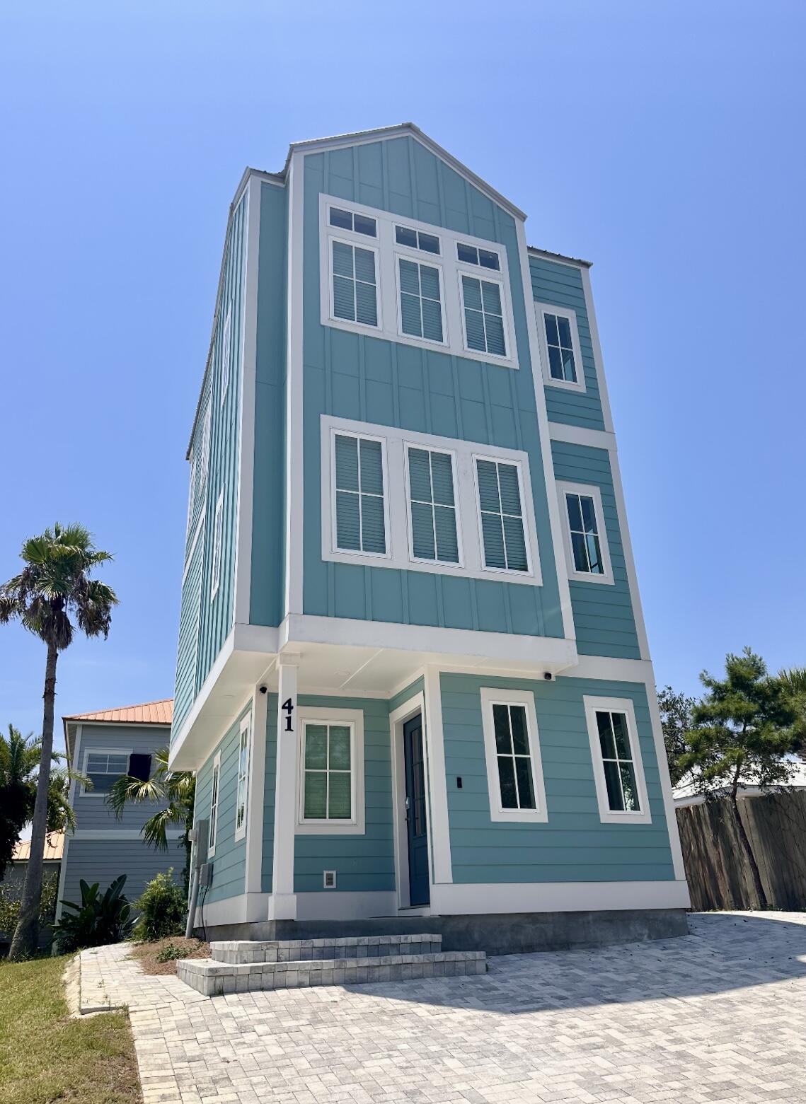 This fully furnished, private, and secluded beach house is a stunning coastal retreat just 2.5 blocks from the sugar-white sands of the Gulf! This beautiful 3-bedroom, 2.5-bath Florida cottage, built in 2022, is nestled in the heart of the highly desirable Village at Blue Mountain Beach. Featuring a vibrant teal exterior, spacious front porch, and Craftsman-style charm, the home offers instant curb appeal. Inside, you'll find an open floor plan filled with natural light and modern finishes, including a chef's kitchen with stainless steel appliances and sleek countertops. Thoughtfully maintained and move-in ready, this home offers gated privacy in a sought-after beachside community. Whether you're looking for a primary residence, second home, or beach getaway, the property also offers the flexibility for rental use if desired.

Beyond its proximity to the beach, you're just steps from charming shops, local restaurants, and neighborhood amenities, giving you the full 30A lifestyle.

Whether you're searching for a personal home, vacation getaway, summer retreat, or your own slice of paradise by the sea, this private beach house is ready for your best offer!