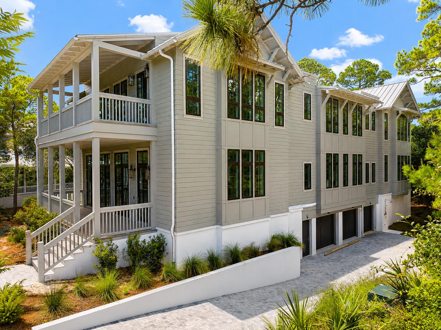 Experience the rare opportunity to own a brand-new custom coastal estate in the exclusive gated community of Lakeplace at Grayton Beach, ideally positioned near the beaches, dining, and lifestyle of Grayton Beach on Scenic 30A. This exceptional 5-bedroom, 5 full bath, 2 half bath residence offers luxury, privacy, and a large lot, rarely found this close to the beach. Set on nearly half an acre, the home encompasses approximately 5,686 square feet of heated and cooled living space with just under 10,000 square feet under roof. Designed for both everyday comfort and grand-scale entertaining, the floor plan blends timeless coastal architecture with elevated modern finishes. The exquisite master suite is thoughtfully located on the main level, offering a private retreat complete with generous proportions, refined finishes, and a spa-inspired bath designed for relaxation and comfort. Upstairs, four spacious guest suites each feature their own private en suite bathrooms, providing exceptional comfort and privacy for family and visitors alike.

The expansive outdoor living area is a true private retreat, featuring a large pool, spacious sun deck, covered lounge areas, and outdoor kitchen--perfect for hosting family and friends or enjoying quiet evenings after a day at the beach. Additional highlights include a three-car garage, oversized driveway, generous guest accommodations, and the peace of mind that comes with brand-new construction.

Tucked along the shores of Western Lake and neighboring Grayton Beach State Park, the community offers a rare blend of coastal and lakefront living. Residents enjoy a serene, low-density setting with access to a shared dock and pier, ideal for paddleboarding, kayaking, or simply taking in the natural beauty. The neighborhood also features a community pool and convenient connectivity to Scenic 30A, placing dining, shopping, and beach access just moments away. With limited rental activity, the atmosphere remains peaceful and private--equally suited for a full-time residence or a refined second home retreat.