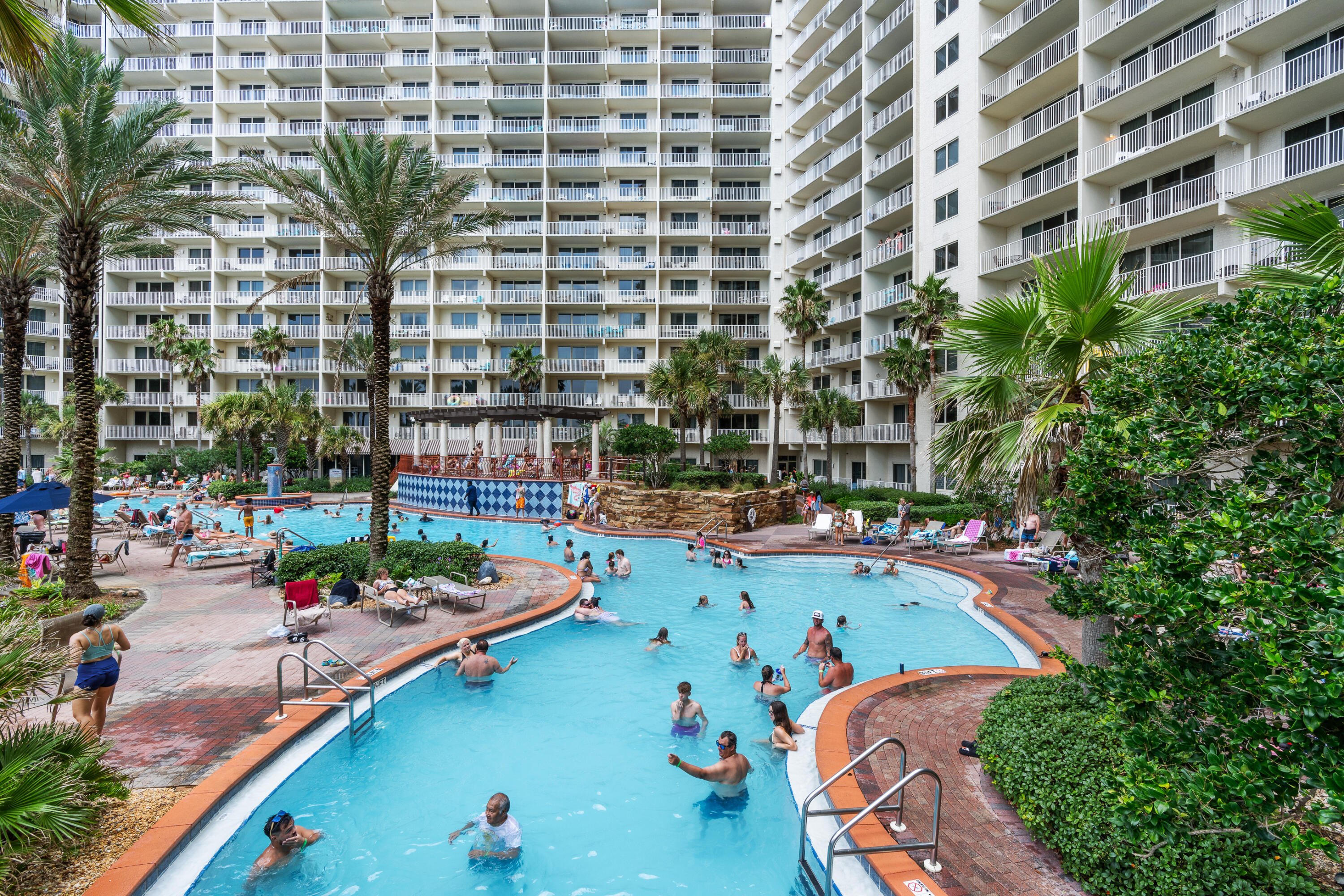 Step into one of Panama City Beach's most iconic resorts - Shores of Panama - and enjoy the rare convenience of a deeded parking space just outside the unit, on the same floor. Skip the elevator waits for exploring and head straight to your door, a luxury most units don't offer.

This SE Gulf-facing unit offers stunning views from the living area and private balcony, perfect for relaxing after a day in the sun. The open layout features granite countertops, tile flooring throughout, and a bunk room with its own door and full bathroom, giving you the privacy and flexibility of a true two-bedroom setup.

Enjoy resort-style amenities including the largest lagoon pool in PCB, indoor pool, spa, sauna, fitness center, and direct beach access. Located steps from dining, Walmart,