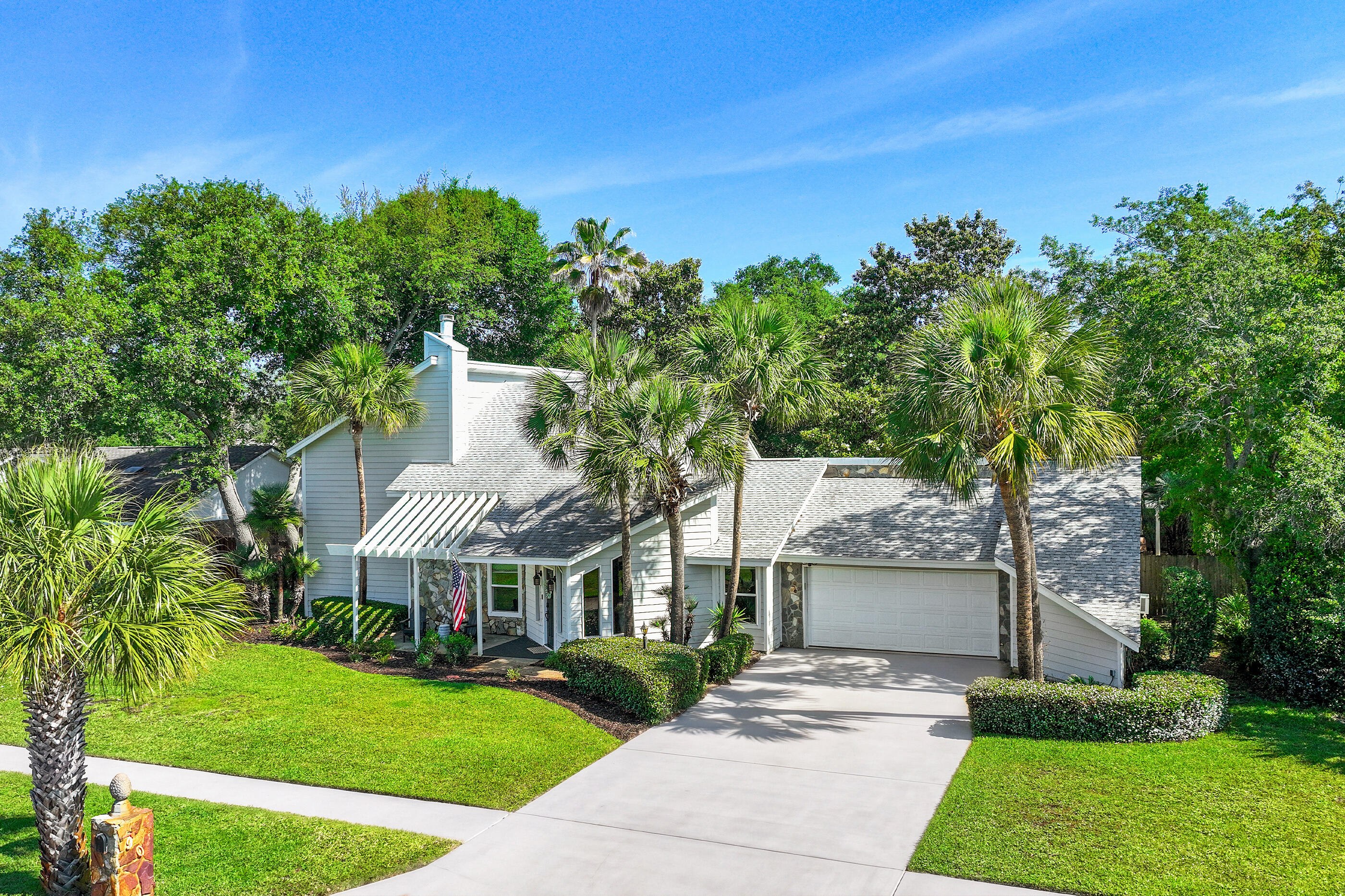If you're looking for a home with personality, this is it. Forget the cookie-cutter layouts; this Indian Bayou stunner features vaulted ceilings and a sunken living room that screams mid-century chic meets modern luxury. Whether you're working from the front-room office or heading out to the new city pickleball courts just 1.5 miles away, this location puts you in the center of it all. The kitchen is a showstopper with custom tile work and stainless appliances, leading out to a private screened-in porch and a backyard big enough for the ultimate outdoor lounge. Spend your Saturdays 2 miles away at the beach and your evenings enjoying the wine cooler at your built-in wet bar. It's stylish, it's secure, and it's perfectly positioned for the best of Destin living.