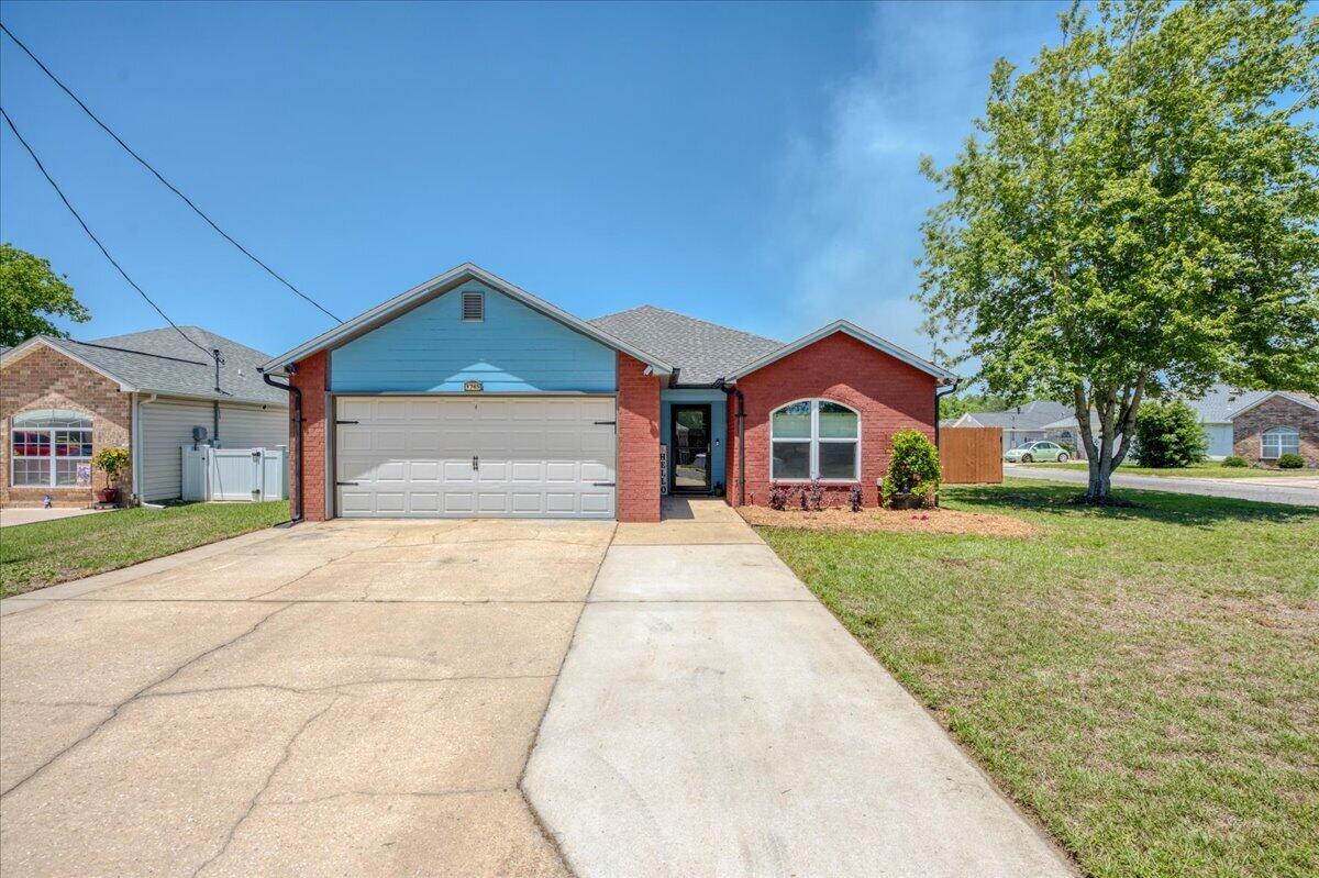 SWYADRN and step into your ''homeowner era''! Check out this fantastic four bedroom home situated between Eglin and Hurlburt AFB and only about 7 miles to the sugar white sands of Okaloosa Island. Pretty brick front and durable concrete-board siding. Open-concept is over-rated... this home is giving ''quiet spaces'', no kitchen noise while you're in the living room; plenty of wall space for your artwork! A separate kitchen with eat-in dining area means less distractions, more mindfulness to enjoy the moment--total green flag. Solid wood cabinets topped with sleek granite counters and finished with stainless steel appliances--the refrigerator is boujee, and the faucet is lit...(touch sensing automatic) The large living room opens to the covered back porch and privacy-fenced back yard--perfect for your furry-family members (pet door already installed!). This floor-plan offers one bedroom separate from the others, located off the foyer--perfect for a home-office. The main bedroom is massive, with a big walk in closet for your drip and stylish en suite bathroom.  Freshly painted a creamy white throughout with energy efficient, custom fabric shades on each window. HVAC replaced in 2023 with high-efficiency 3 ton 22.5 seer.  Lots of upgrades in 2020: roof; hurricane rated windows; Water heater, duct work, and electrical wiring also replaced in 2020. Big laundry room (washer and dryer convey!) and a motorcycle garage (or perfect for storing your lawn mower, tools and fishing poles). This house is mogging; no matter your situationship, single or with your bae, first time homebuyer or boomer, Don't miss out on this one, or you'll be in your salty feelings--Big Yikes! Don't be lowkey, set your appointment to see this home today.

Conveniently located within minutes of shopping, military bases, schools, the hospital and beaches! Quality updates and smart features (like the storm door with hidden screen and the automatic bathroom exhaust fan with humidity sensor) priced right, and ready for new owners. 

Square footage taken from prior appraisal. All information provided believed to be accurate, buyer to verify all facts deemed important.