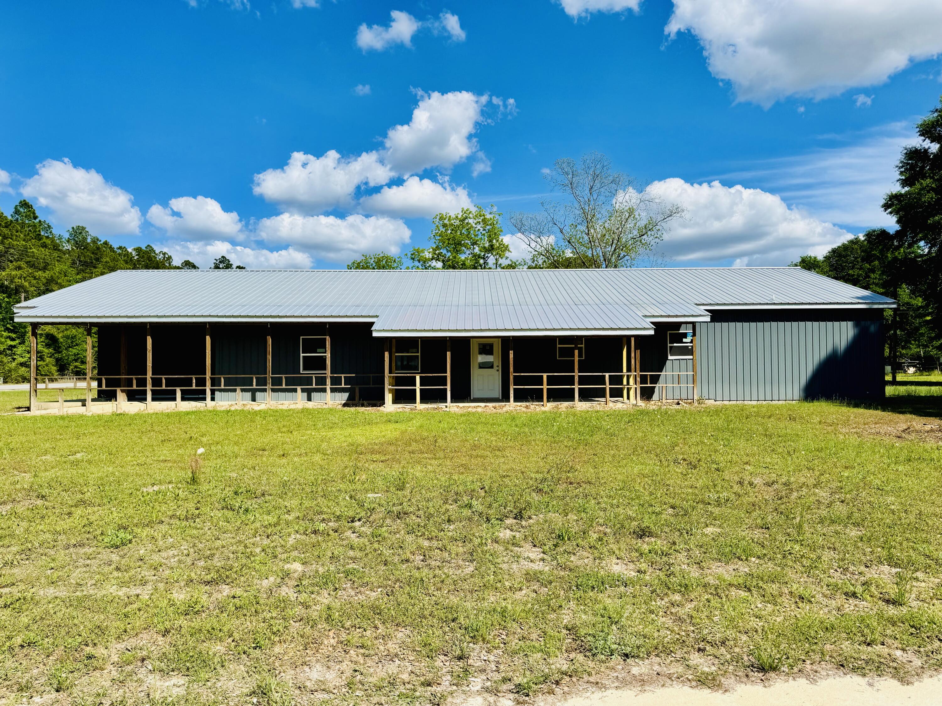 Partially finished 4-bedroom, 3.5-bath barndominium offering approximately 40' x 95' of space, conveniently located just minutes from Lake Jackson in Florala, Alabama. This property presents a great opportunity to customize and complete your dream home.

The structure features spray foam insulation in the attic and rolled insulation in the walls. Electrical wiring has been run, and plumbing is partially completed. A new HVAC unit and ductwork are included with the sale but have not yet been installed.

With major groundwork already underway, this property is ideal for investors or buyers looking to add their personal finishing touches in a desirable location near the lake.