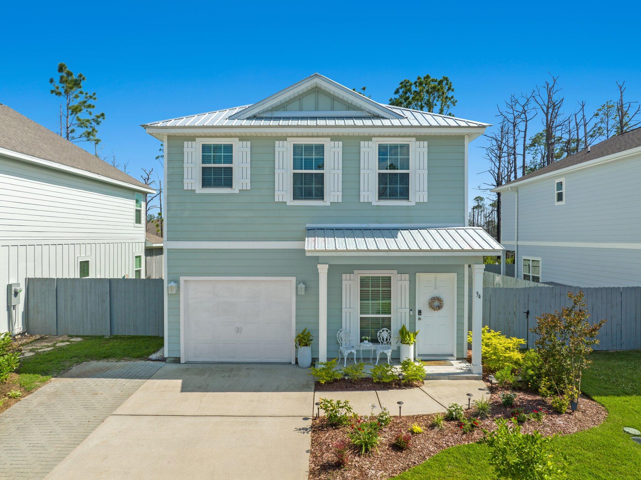 PRICE REDUCED $20,000! Attractive, comfortable Florida Cottage S of Hwy 98 conveniently located just off main thoroughfare connector Thompson Road. Low HOA fees, pets allowed and no short-term rentals! Exterior features new metal, galvalume roof, 2 new heat pumps and all new paint 2021. Interior boasts new appliances including natural gas stove, all new interior walls, paint, insulation, ceiling fans and most lighting fixtures also in 2021. 9 ' ceilings, granite counter tops, Luxury Plank Vinyl floors, recessed lighting throughout. Reaaaaaar screened porch/patio added 2025. All appliances inc. washer/dryer convey as does free standing fireplace unit. Golf cart may be included in sale with price & terms contract acceptable to sellers.