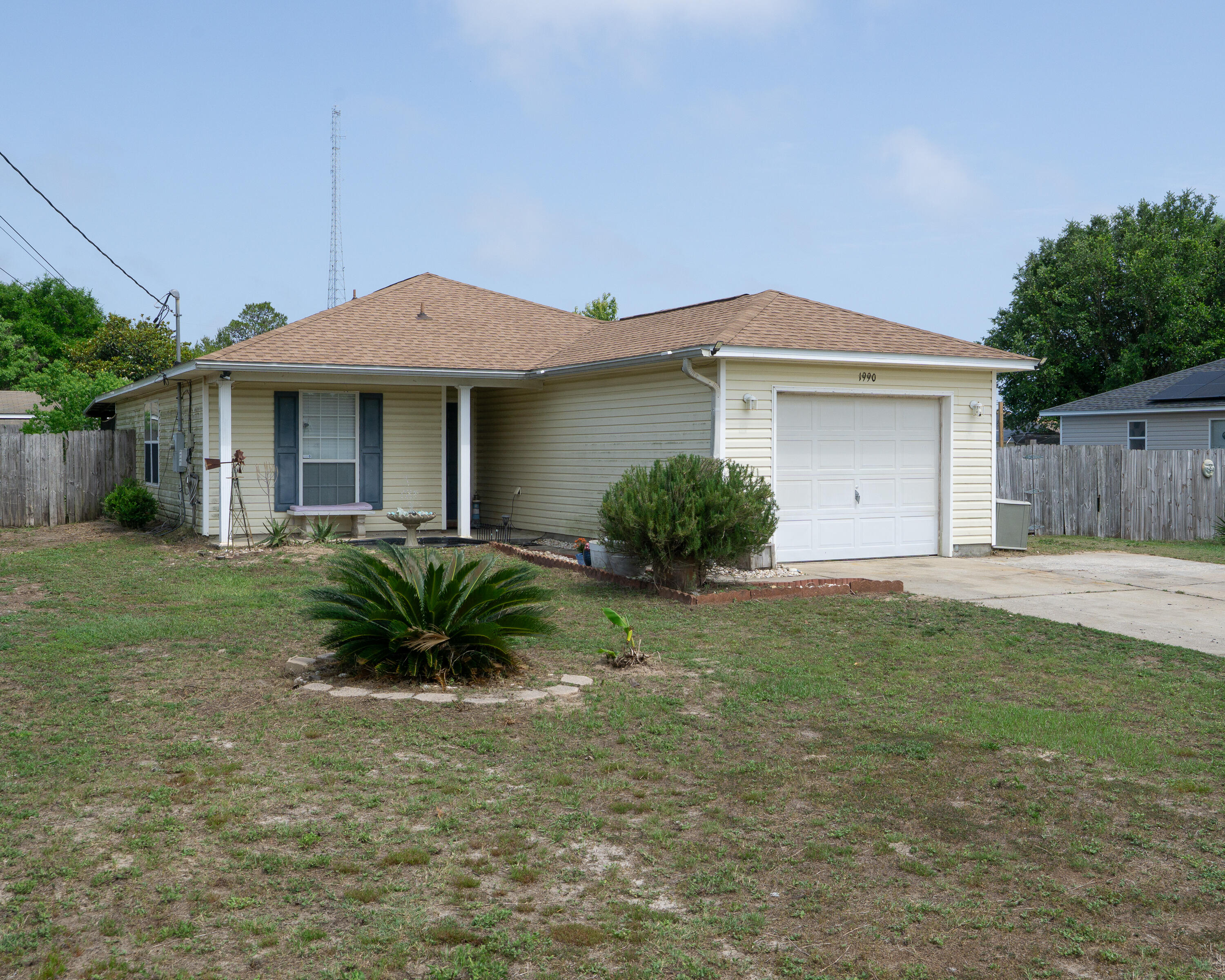 Affordable home close to the beach with an adorable little coy pond and fountain to greet you at your front steps!This home is located near the gulf, the sound, shopping and restaurants! Enjoy a fenced in back yard, plenty of parking and a one car garage. New roof in 2024, 10X12 back porch, storage shed. Washer and dryer convey with sale. Come take a look!
