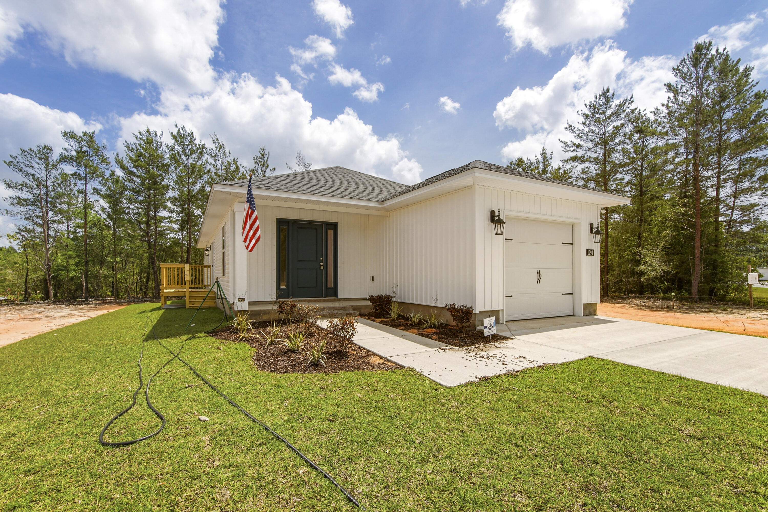 Fresh, simple, and easy to love. This newly built home by Flynn Built offers 2 beds and 2 baths and a single car garage with a light, open layout that feels comfortable and livable. Inside, you'll find durable LVP flooring, granite countertops throughout, stainless appliances and a bright, airy feel that makes the space live larger than expected. The exterior features low-maintenance vinyl siding, making upkeep easy. Also included is a one-year builder warranty for added peace of mind. Plus, with a full-price offer, buyers receive $6,000 toward closing costs, making this a super option for first-time buyers, those downsizing, or anyone looking for a clean, move-in ready start.