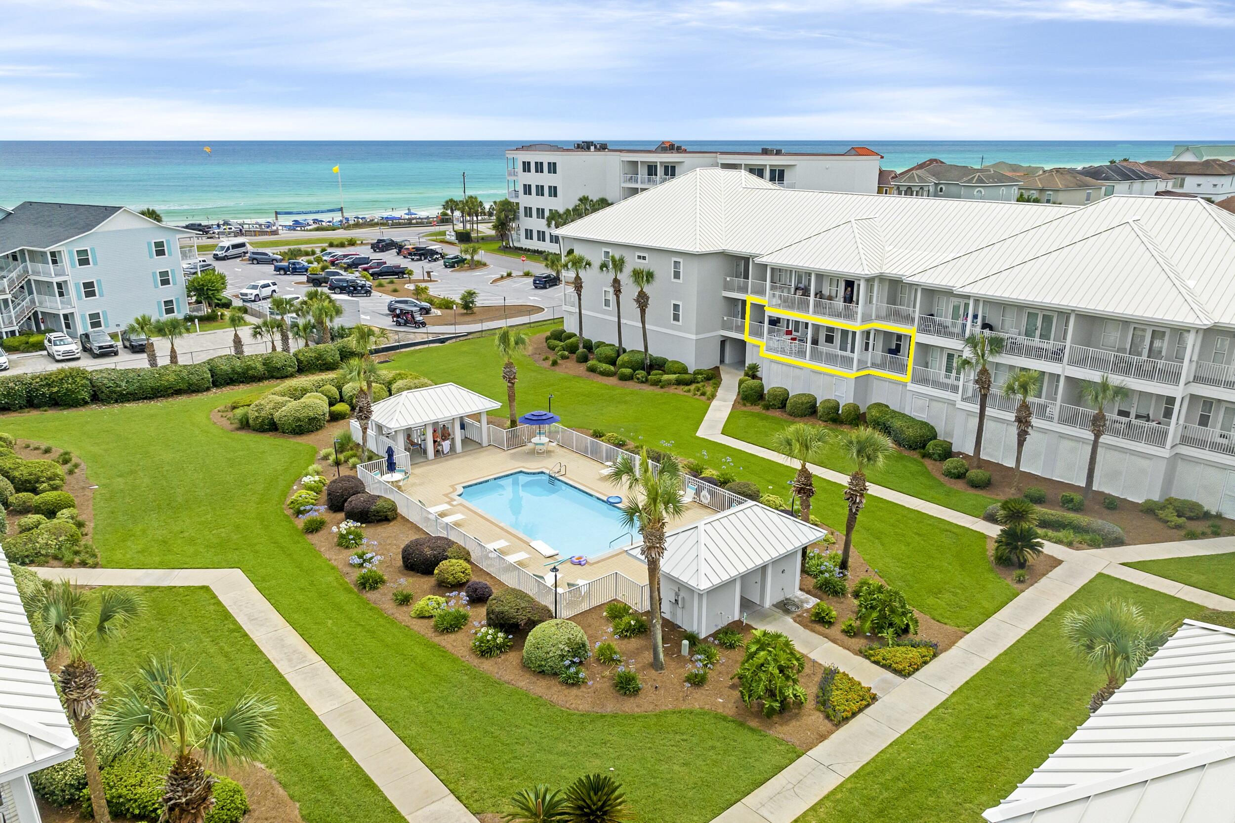 RARE BEACHSIDE CONDO WITH 4-CAR DEEDED GARAGE, 2 PRIMARY SUITES & OVER-SIZED BALCONY ACROSS FROM THE GULF. Discover one of the most unique opportunities along Scenic Gulf Drive. Located in the exclusive, GATED PAVILION PALMS COMMUNITY OF ONLY 30 RESIDENCES, this spacious 3-bedroom, 3-bath condominium offers a floor plan that feels more like a home than a traditional beach condo. Unlike the narrow ''shotgun-style'' layouts common along the coast, this residence features an exceptionally WIDE OPEN-CONCEPT LIVING, DINING, AND KITCHEN AREA that creates an inviting gathering space for family and friends. The expansive living room opens to a LARGE COVERED BALCONY spanning the living area and both primary suites, providing plenty of room for outdoor dining, relaxing, and enjoying the PARTIAL GULF VIEWS and coastal breezes. Designed for comfort and flexibility, the floor plan includes TWO TRUE PRIMARY SUITES, each with private baths and direct balcony access, making it ideal for multi-generational families, second-home owners hosting guests, or buyers seeking privacy for family and visitors. The third bedroom and third full bath provide additional accommodations without sacrificing space. The floor plan also includes a FULL-SIZE LAUNDRY ROOM, a feature rarely found in many beach condos. Lovingly maintained by the original family owners since construction, this residence has been GENTLY USED AND NEVER RENTED, offering a rare opportunity for buyers seeking a well-cared-for property... with tremendous potential to personalize and update to their tastes.

One of the most impressive features is the DEEDED PRIVATE GARAGE LARGE ENOUGH FOR UP TO FOUR VEHICLES, plus additional driveway parking. Whether you own multiple vehicles, golf carts, beach toys, paddleboards, or bicycles, you'll appreciate the storage and convenience that is nearly impossible to find this close to the beach. A separate DEEDED STORAGE ROOM provides even more space for owners who enjoy extended stays at the coast. The garage and storage areas are designated limited common elements specifically assigned to the unit.

Situated directly across Scenic Gulf Drive from the sugar-white sands and emerald waters of Miramar Beach, owners enjoy easy beach access while remaining close to restaurants, shopping, entertainment, and all the conveniences that make this area one of Northwest Florida's most desirable coastal destinations. SHORT-TERM RENTALS ARE PERMITTED, offering owners the flexibility to generate rental income while still enjoying the property as a primary residence or family beach retreat.

If you've been searching for a beach property that offers the space of a home, the convenience of a condo, TWO PRIMARY SUITES, A MASSIVE GARAGE, DEEDED STORAGE, PARTIAL GULF VIEWS, and a LOW-DENSITY GATED COMMUNITY, this Pavilion Palms residence deserves your attention.