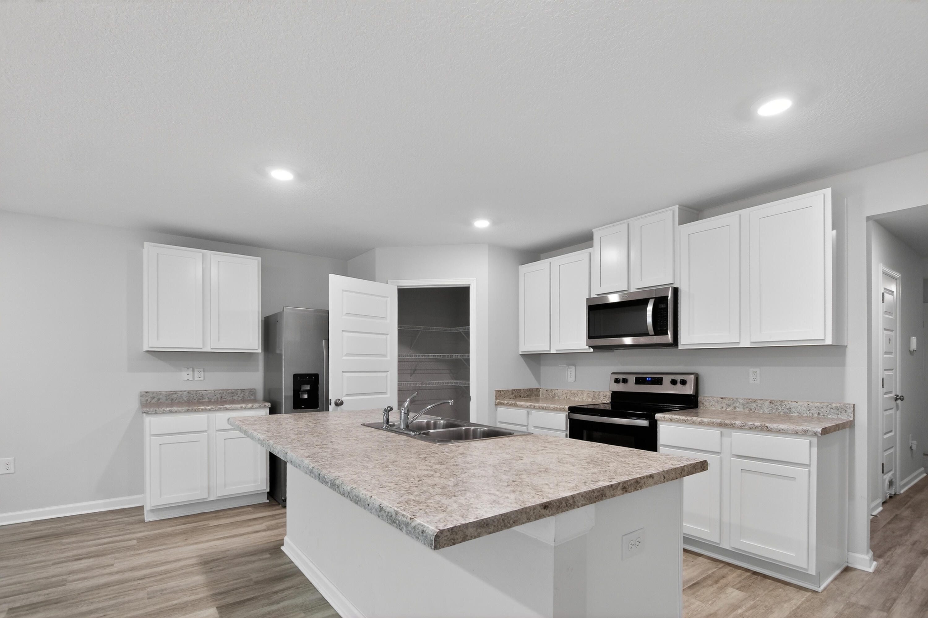 🏡 **HALF OFF YOUR FIRST FULL MONTH'S RENT!** Plus, your **application fee will be refunded upon approval and a successful move-in!**

Be the next to call this beautiful **2023-built** home in the desirable **Heritage Plantation** community your own! This pet-friendly 4-bedroom, 2-bath home offers 1,791 square feet of thoughtfully designed living space with an open-concept layout that's perfect for both everyday living and entertaining.

The spacious kitchen features a large center island, stainless steel appliances, ample cabinet space, and flows seamlessly into the dining and living areas. The split-bedroom floor plan provides added privacy, while the primary suite offers a spacious walk-in closet and private bath. Luxury vinyl plank flooring in the main living areas makes for easy maintenance, with comfortable carpet in the bedrooms.

Step outside to enjoy the covered back patio overlooking a generous **0.42-acre lot**, offering plenty of room to relax, play, or entertain. Additional features include a two-car garage, indoor laundry area, and modern finishes throughout.

Residents of Heritage Plantation enjoy access to a community pool while being conveniently located just minutes from North Crestview, shopping, dining, and Highway 85 for an easy commute.

Available for immediate occupancy. Pets allowed with owner approval. Schedule your private showing today and take advantage of this incredible move-in special!