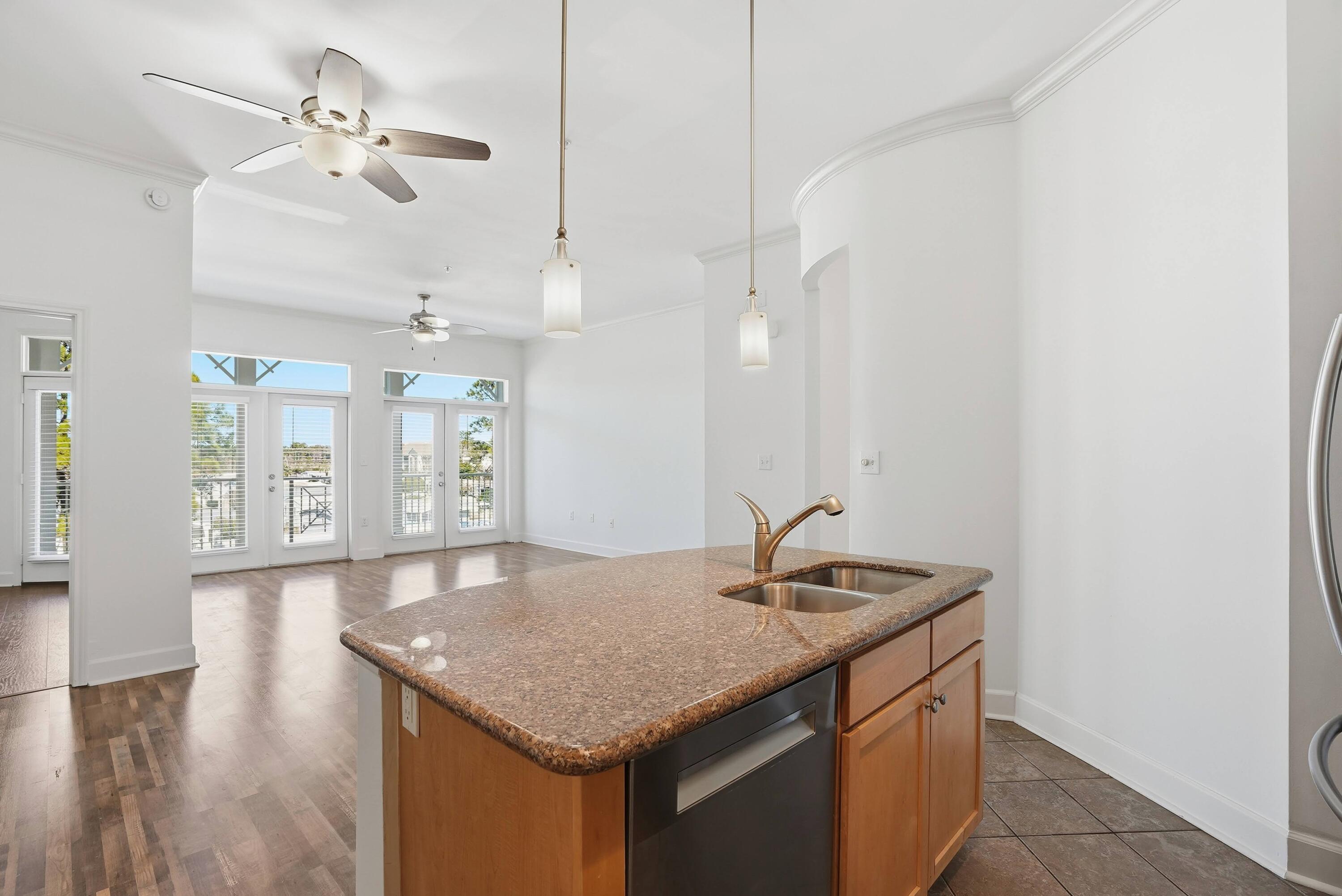 Welcome to Island Reserve 5304. This beautifully updated condo is completely move-in ready and intentionally priced to sell! Ideally situated on the 3rd (top) floor, there are no upstairs neighbors. Plus, you can park on the same level of the parking garage and arrive at your front door with ease. No long treks through hallways and no need for stairs or elevators. Inside the unit, the open-concept floor plan impresses with soaring 10-foot ceilings and fresh, modern finishes. The unit was freshly painted in Sherwin Williams Alabaster and features hard surface flooring throughout (no carpet!). The kitchen is equipped with stainless steel appliances, a newer dishwasher, and flows seamlessly into the dining and living areas. Double balcony doors and high windows allow plenty of natural light. The large balcony overlooks a quaint 55+ community, providing a more secluded and private view than the interior-facing units. This split floor plan includes two spacious bedrooms, each with its own walk-in closet and private en-suite bath, offering maximum comfort and privacy. There is a half bath in the hallway plus a laundry closet with an included washer and dryer. For added peace of mind, this home recently completed a home inspection. The water heater is 2019 and the HVAC is 2017. On the exterior, Building 5 has already been repainted and looks fantastic. Island Reserve is a gated, perimeter-fenced community known for its incredible resort-style amenities and vibrant atmosphere. It is very much a vacation lifestyle. Residents enjoy a massive 1-acre lagoon pool with waterfalls, a state-of-the-art fitness center, a theater room, and indoor basketball/pickleball courtsperfect for escaping the summer heat or the winter cold! The HOA is active with events and activities, fostering a welcoming neighborhood feel. With no short-term rentals allowed, residents can enjoy a true sense of community year-round. The HOA has completed required inspections and there are no pending special assessments. HOA dues are reasonable at only $619/month. I am the owner and real estate agent. I have upgraded and priced this unit to sell! A video tour is also available. Schedule your showing today!