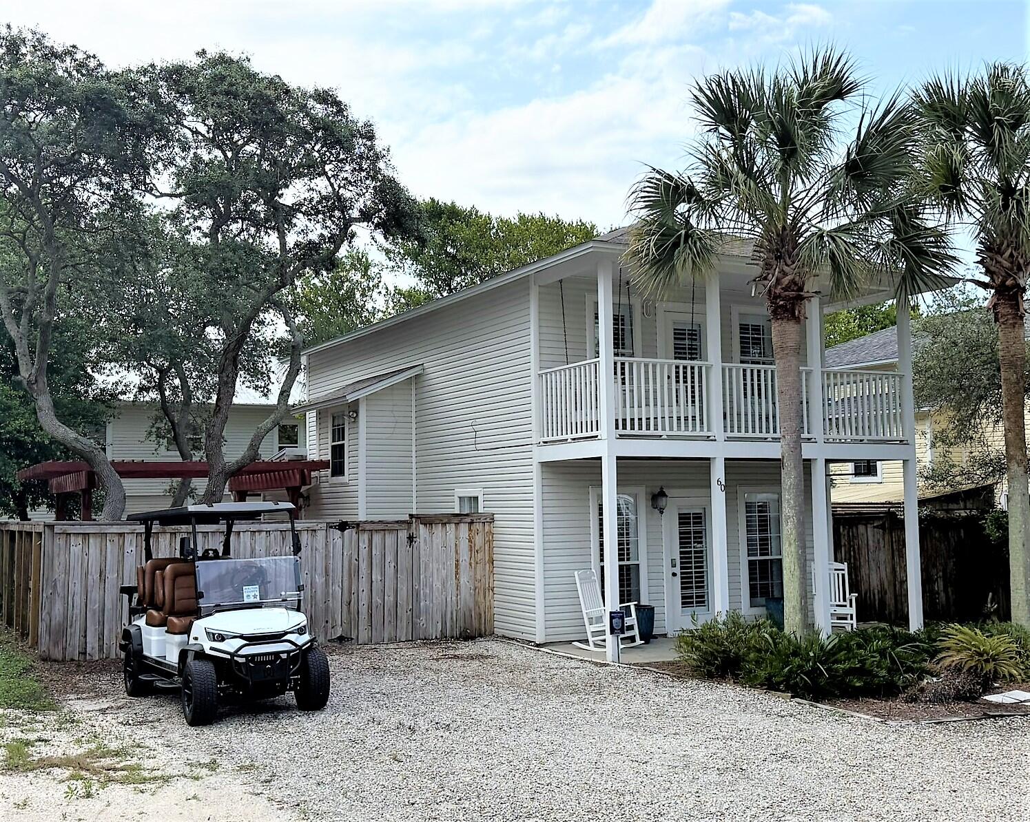 Sale is contingent upon Seller entering into a formal purchase contract for a replacement home.  This is a wonderful beach cottage in Blue Mountain Beach! This 2 bedroom/2 bath home is a perfect rental investment property. 
Upgrades include wood floors throughout, plantation shutters, painted wood ceilings, updated kitchen and bathrooms. 
Backyard is a private retreat with wood trellis and beautiful oak trees. Perfect for entertaining and cooking out. Bonus-large storage shed in backyard also. 
Walk to the beach, shops and restaurants nearby. New roof in Nov 2023.
New hot water heater 2019. Gross rental in 2022: $37K, 2023: $27K. 
Make an appointment to see! 60 Marlin Street, a pristine and fully furnished coastal retreat nestled in the highly coveted Blue Mountain Beach community of Santa Rosa Beach. This charming two-story Florida cottage perfectly blends timeless 30A style with unbeatable investment versatility. Located less than a half-mile from the neighborhood's legendary white-sand beaches and emerald Gulf waters, the property stands out with its bright, open-concept living and dining layout accented by beautiful hardwood floors and elegant plantation shutters. The upper-level primary suite offers a private escape, opening directly onto a spacious, covered second-story porch that is absolutely perfect for enjoying refreshing morning breezes or winding down with the sound of the waves.

Designed for both effortless coastal living and high-performing short-term rental potential, this turnkey property is a standout opportunity along the 30A corridor. The exterior features a rare, private yard space ideal for post-beach relaxation, storage for your beach gear, and outdoor entertaining. Whether you are searching for a personal slice of paradise, a lucrative vacation rental asset, or a second home at the beach, its premier location places you a quick walk or bike ride to local favorites like the Blue Mountain Beach Creamery, local boutiques, and pristine beach access points. Don't miss this chance to own a piece of classic Florida charm in one of Walton County's most beloved and scenic beach neighborhoods.