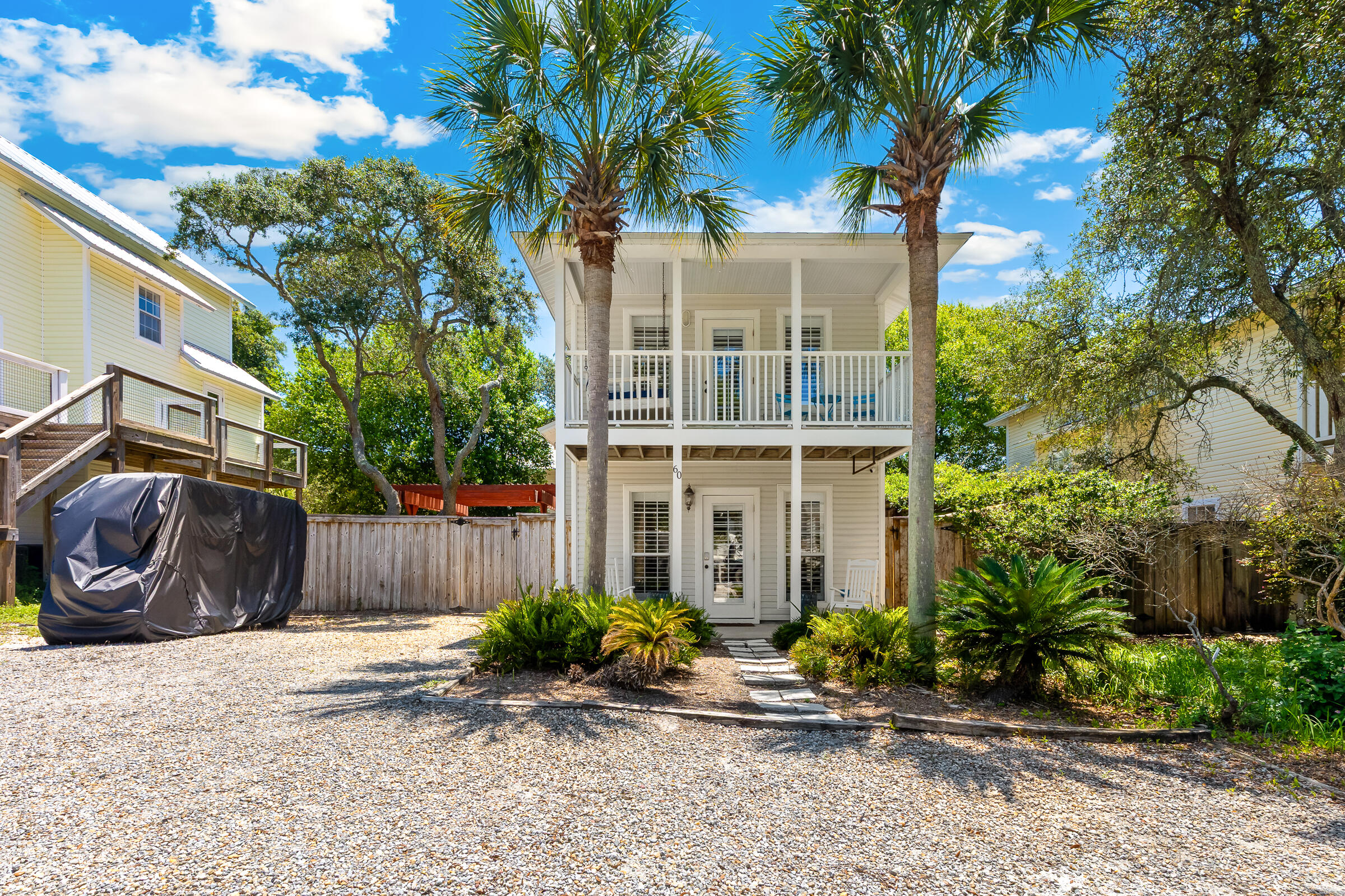 This is a wonderful beach cottage in Blue Mountain Beach! This 2 bedroom/2 bath home is a perfect rental investment property. 
Upgrades include wood floors throughout, plantation shutters, painted wood ceilings, updated kitchen and bathrooms. 
Backyard is a fenced private retreat with wood pergola and beautiful oak trees. Perfect for entertaining and cooking out. Bonus-large storage shed in backyard also. 
Walk to the beach, shops and restaurants nearby. New roof in Nov 2023.
New hot water heater 2019. Gross rental in 2022: $37K, 2023: $27K. 
Make an appointment to see!
Golf Cart and covered patio furniture does not convey. Sale is contingent upon Seller entering into a formal purchase contract for a replacement home, which is currently available.  60 Marlin Street, a pristine and fully furnished coastal retreat nestled in the highly coveted Blue Mountain Beach community of Santa Rosa Beach. This charming two-story Florida cottage perfectly blends timeless 30A style with unbeatable investment versatility. Located less than a half-mile from the neighborhood's legendary white-sand beaches and emerald Gulf waters, the property stands out with its bright, open-concept living and dining layout accented by beautiful hardwood floors and elegant plantation shutters. The upper-level primary suite offers a private escape, opening directly onto a spacious, covered second-story porch that is absolutely perfect for enjoying refreshing morning breezes or winding down with the sound of the waves.

Designed for both effortless coastal living and high-performing short-term rental potential, this turnkey property is a standout opportunity along the 30A corridor. The exterior features a rare, private yard space ideal for post-beach relaxation, storage for your beach gear, and outdoor entertaining. Whether you are searching for a personal slice of paradise, a lucrative vacation rental asset, or a second home at the beach, its premier location places you a quick walk or bike ride to local favorites like the Blue Mountain Beach Creamery, local boutiques, and pristine beach access points. Don't miss this chance to own a piece of classic Florida charm in one of Walton County's most beloved and scenic beach neighborhoods.