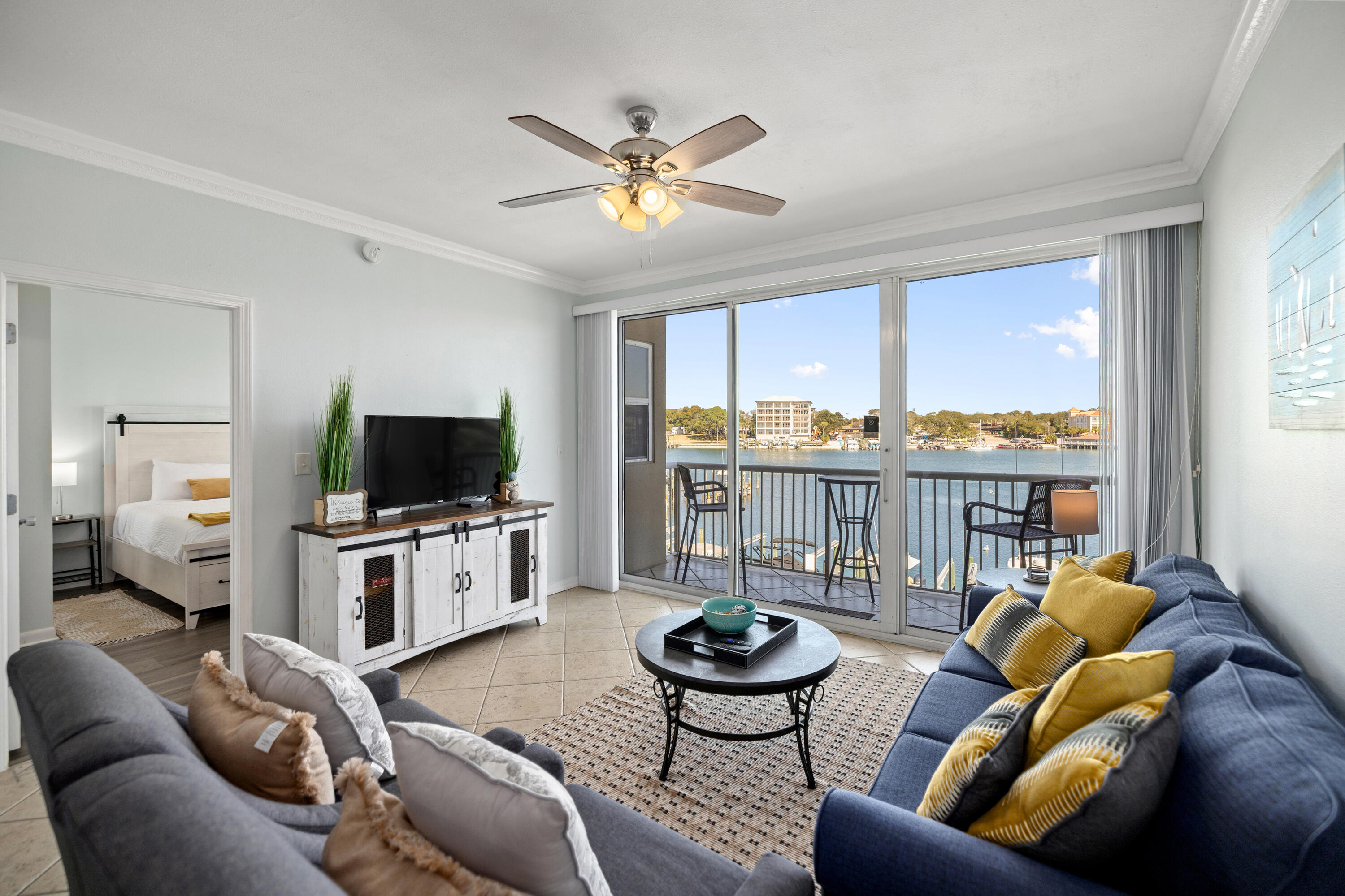 Welcome to your own slice of waterfront paradise, complete with BOAT SLIP! From your private balcony, enjoy peaceful mornings with a cup of coffee, and evenings with a glass of wine or cocktail watching boats glide by or seeing fireworks over FWB on special occasions!
Have a boat? This unit comes with a slip and aluminum electric lift, making storage and use, extremely convenient! Inside, the unit is open & airy with stunning water views from the living area, kitchen, and primary suite.  Modern upgrades include luxury vinyl plank flooring, crown molding, stainless steel appliances, updated lighting, & modern furniture.  Designed for comfort and convenience, the unit also features a second bedroom suite, a spacious laundry room, abundant storage, and a prime location with amazing benefits. Located in a gated community, residents and their guests enjoy resort-style amenities including a waterfront pool and hot tub, marina access, storage lockers, assigned covered parking, and a private beach walkover, making this an ideal property to enjoy all our area has to offer while still being safe and quiet. 
Waterfront living, boating convenience, and breathtaking views -- all in one exceptional property.