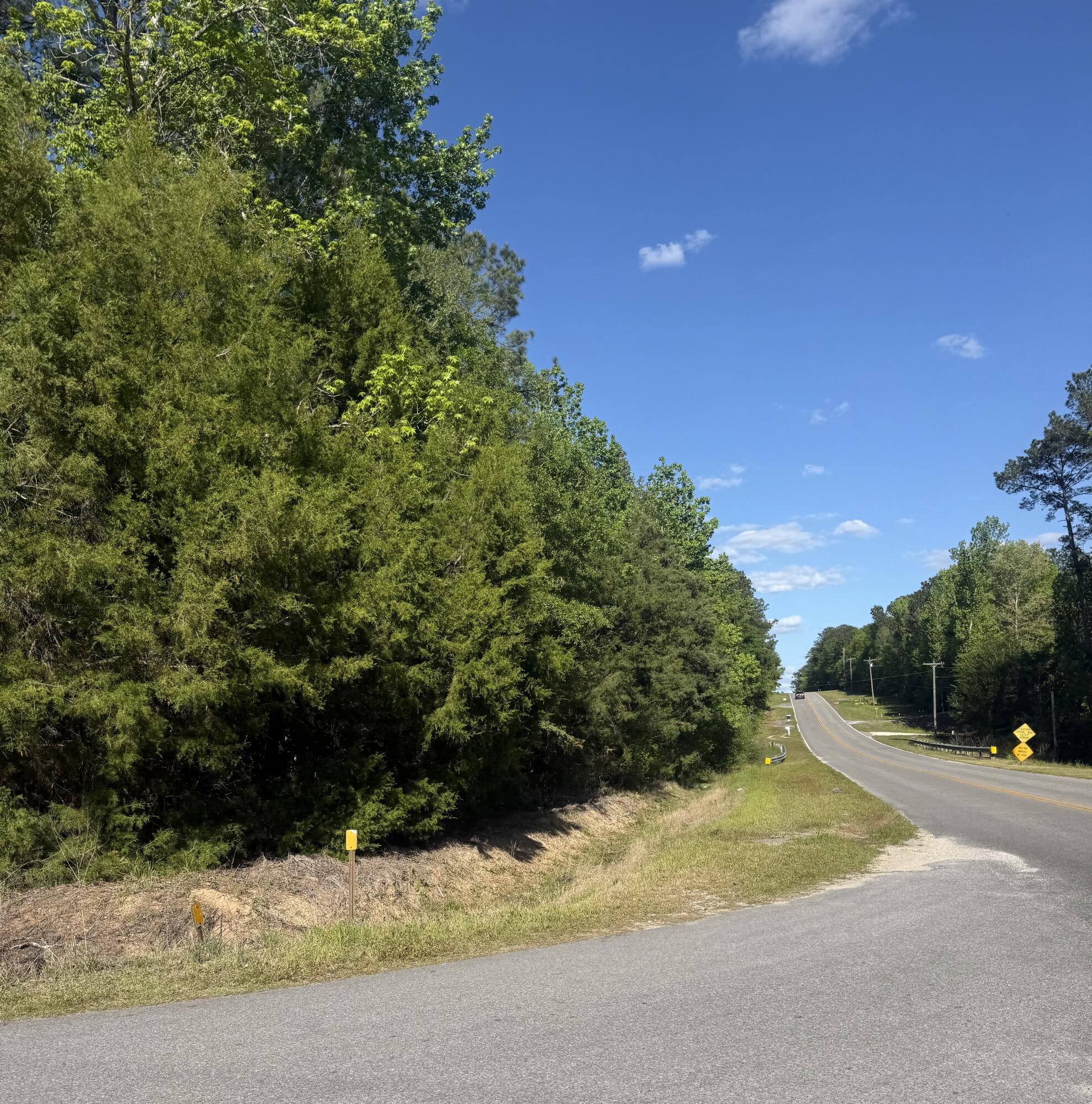 Discover the perfect blend of privacy and convenience with this 10-acre corner parcel located at Bob Sikes Road and Timberlake Drive. A small creek meanders through the property, offering a peaceful setting. Ideally situated for an easy commute to Eglin Air Force Base and the beaches of South Walton, this property gives you the best of both worlds of quiet country living with quick access to work and the coast. No survey is currently available and utilities have not yet been established, giving you a blank canvas to create your vision from the ground up. Come take a look. You just might find it's exactly what you've been searching for.