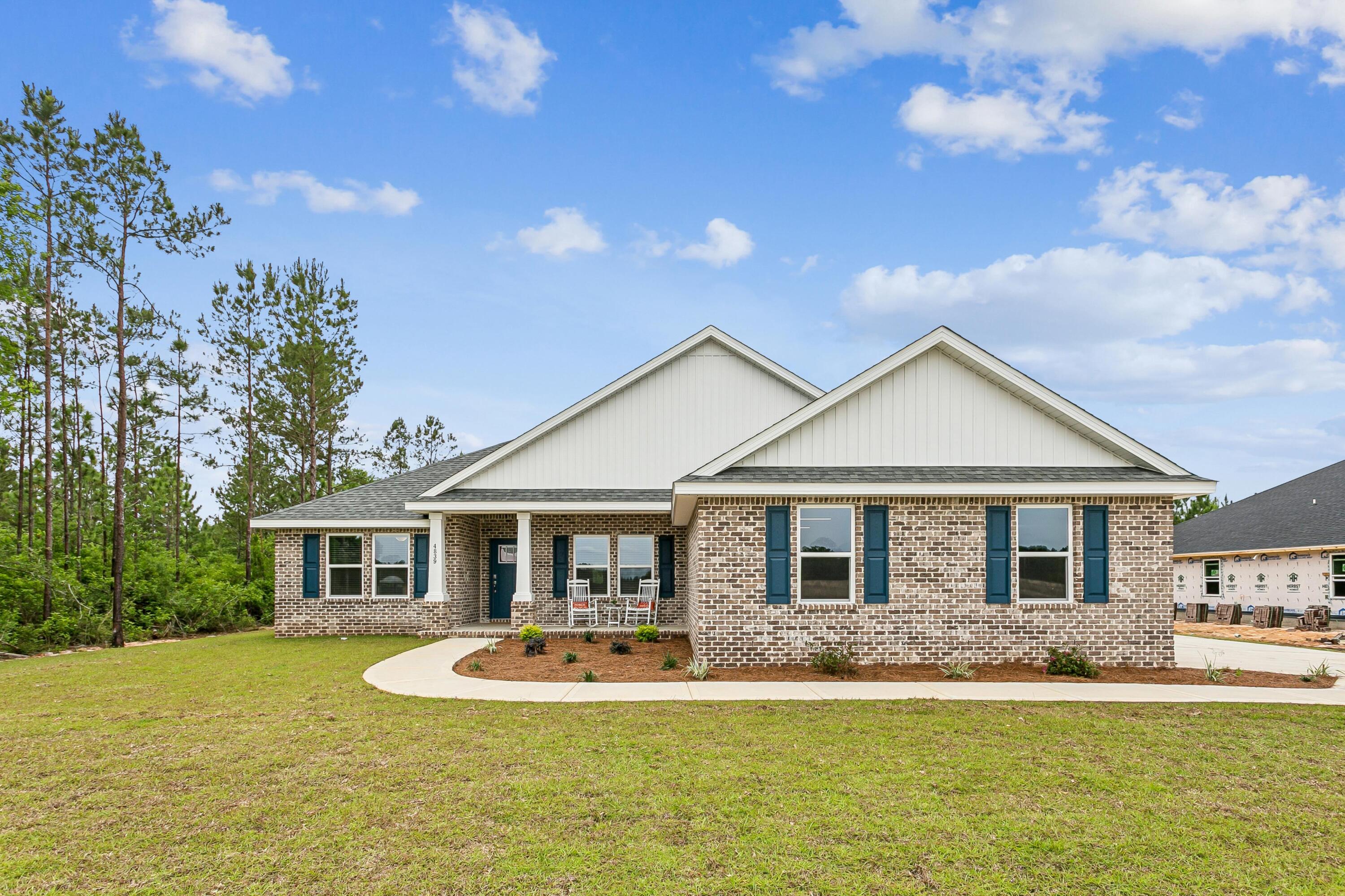 Welcome home to your new country estate for laid back living with all the conveniences of a modern, wonderfully built home. This stunning Turquoise Estate Floor Plan is situated on a .51 acre lot in the Prosperity Point community in Milton. Offering 5 bedrooms, 3 full bathrooms, and 2,711 square feet of beautifully designed living space, this home blends modern convenience with spacious country charm. The oversized homesite is tucked away in a quiet, low-traffic street surrounded by nature, providing the perfect backdrop for privacy and peaceful living. Inside, the home showcases Herbst Homes' signature quality and attention to detail, with upscale features throughout. You'll find high-end cabinetry, granite or quartz countertops, and premium finishes that elevate every space. The kitchen is equipped with stainless steel appliances, under cabinet lighting, soft close cabinets, a walk-in pantry, all designed for both function and beauty.
Additional upgrades include a whole-house blinds package, crown molding in the common areas, and durable luxury vinyl plank flooring. The spacious, split-bedroom layout includes a luxurious primary suite with a tray ceiling, tiled walk-in shower, garden tub, double vanities, and a generous walk-in closet. A side-entry three-car garage elevates curb appeal with a clean, upscale look while providing ample space and functionality. This home has it all!
Pictures are of a similar home, colors may vary. Projected completion is November 2026.