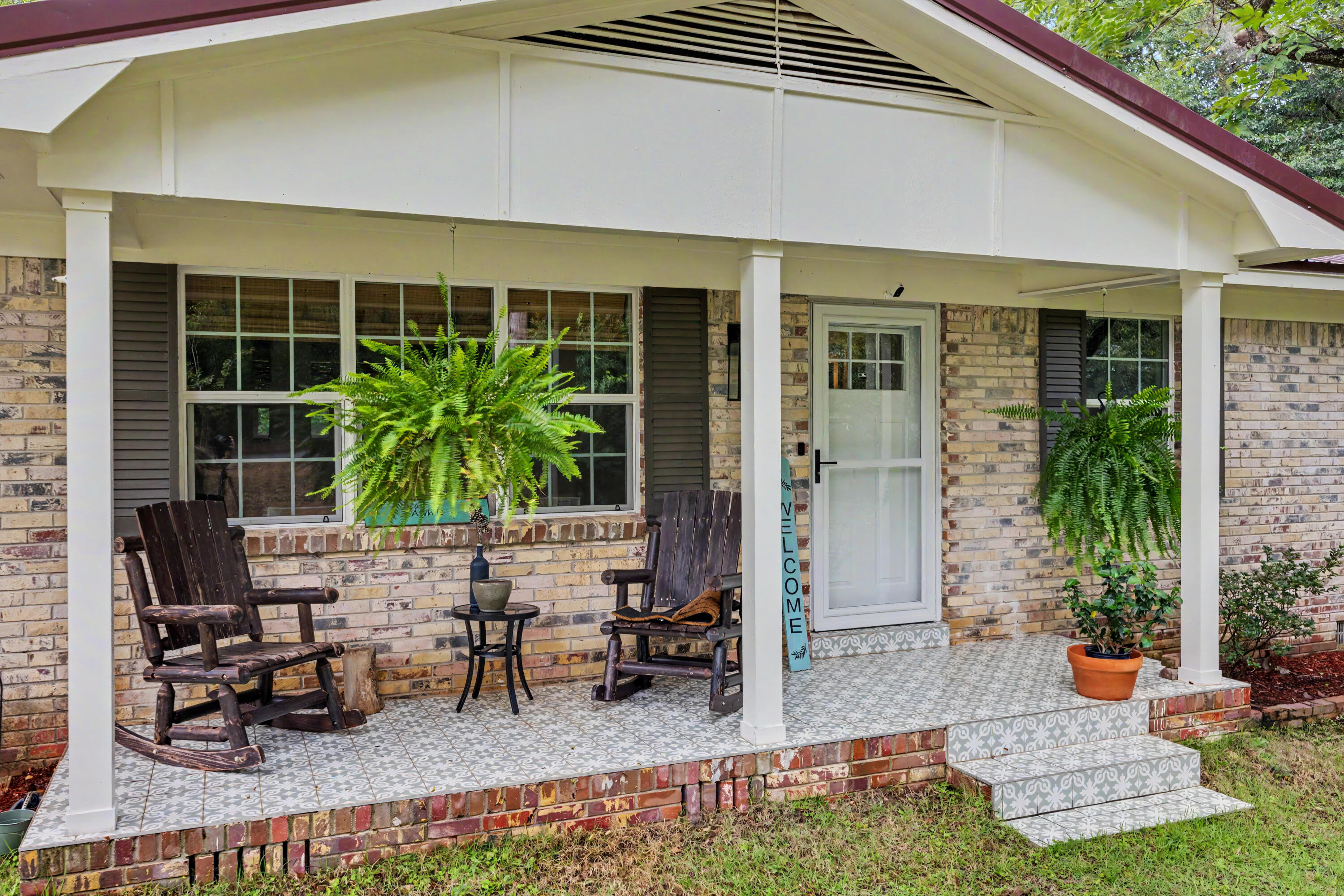 Welcome home! Nestled on a private, tree-shaded .34-acre lot just minutes from downtown Crestview, this beautifully updated farmhouse-inspired home offers the perfect blend of character, space, and flexibility. The main home features an open-concept living, dining, and kitchen area with updated flooring, raised ceilings, a spacious island, quartz-style countertops, modern cabinetry, stainless appliances, and abundant natural light. The split layout includes 3 bedrooms and 2 updated bathrooms, providing room for everyone plus a separate living area with barn-style door adds versatility for a media room, playroom, or home office. Step outside to enjoy the covered front porch, fenced backyard, patio entertaining space, mature trees, and peaceful surroundings. One of the property's standout features is the detached accessory dwelling unit (ADU), offering endless possibilities for guests, multi-generational living, a home business, hobby space, or potential rental income. Over 600 soft, this ADU has it's own bedroom, bathroom, laundry and efficiency kitchen! Additional features include a metal roof, updated finishes throughout, privacy fencing, and a convenient location near shopping, dining, schools, and major commuter routes. A rare opportunity to own a property with both charm and income-producing potential in the heart of Crestview!