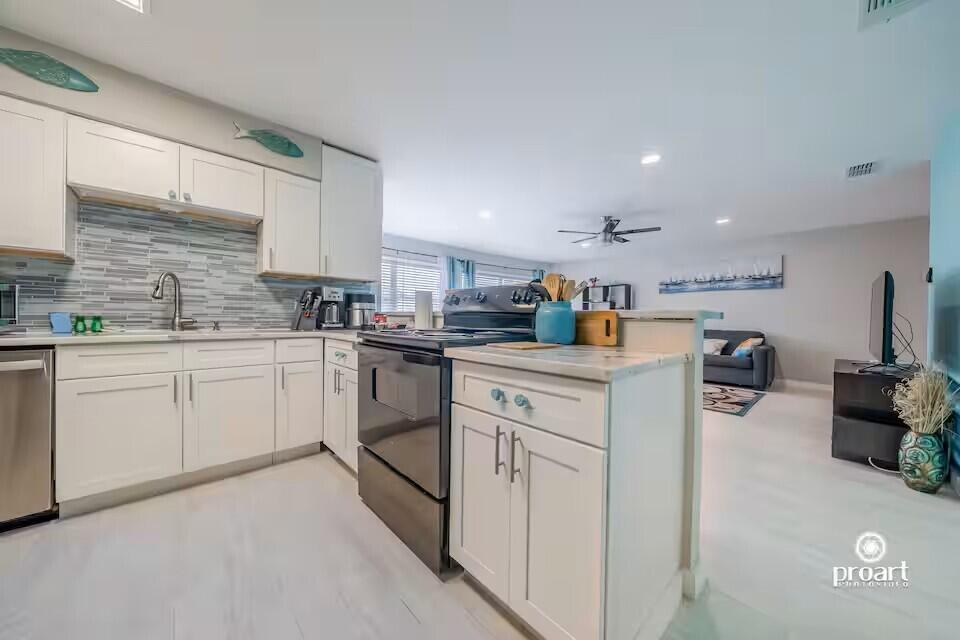 Rare Find 2 Bedrooms 2 Bathrooms (full size) + Laundry Room. Gulf Terrace Condominium 0.8 miles to public beach access. Remodeled, Clean and Spacious! Both Tourists & Locals Love the Convenient Location. Short Term rentals Allowed, Active Airbnb! Furniture included. Community Features: Free Parking, Gated Entrances from HWY 98 and Airport Rd, Access to 3 swimming pools, Tennis/Pickleball court, Dog Park, EV chargers, maintained green areas, picnic tables & a lake. HOA Coverage: building insurance and exterior maintenance, water, internet, sewer, trash, landscaping, and maintenance of pools and gates. Owner pays Electric Only. Active Airbnb & Gated Community contact agent for showing schedule and access instructions.