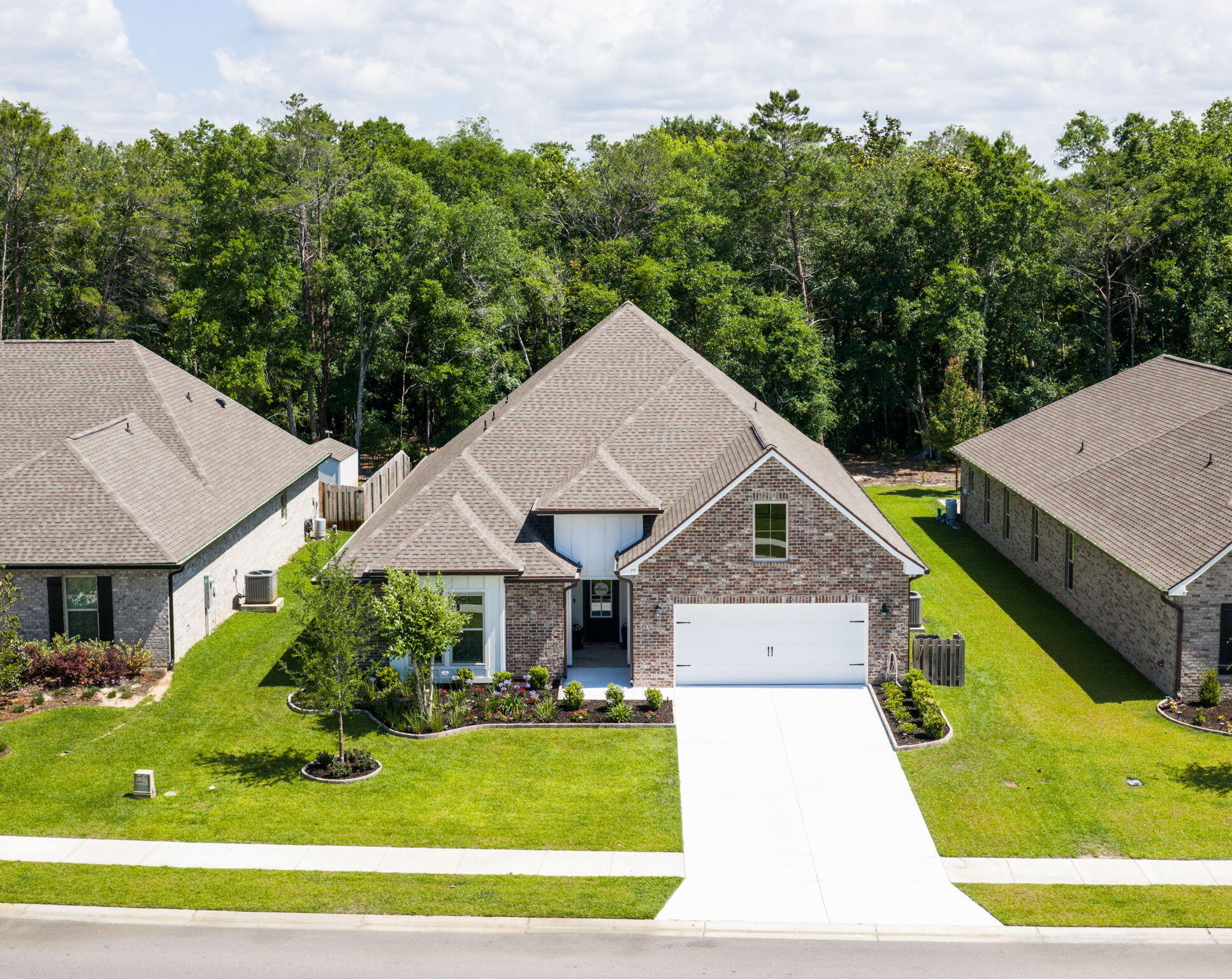 Welcome to the popular Sycamore III floor plan in the sought-after Starburst section of Hammock Bay! This meticulously maintained 4-bedroom, 2-bath home offers an open layout with thoughtful upgrades and functional spaces throughout.
The kitchen features a large island, walk-in pantry, recessed lighting, crown molding, under-mount sinks, and flows perfectly into the main living and dining areas -- ideal for entertaining or everyday living. A flex space offers room for an office, playroom, or second sitting area.
The spacious primary suite includes separate vanities, a relaxing garden tub, custom tiled shower, and walk-in closet. Bedrooms 3 and 4 also feature walk-in closets, and the secondary bath includes a double vanity.
Step outside and enjoy the screened-in lanai overlooking the beautifully maintained backyard with pavers and a peaceful natural area behind the home that will not be built on. The property also includes a well-water deionization system for the sprinkler system and an 8x12 shed with electric -- perfect for storage, hobbies, or a workshop space.
The oversized garage includes a special bump-out area plus added storage space for tools, bikes, or seasonal items. Additional exterior features include gutters around the entire home and permanent flower bed edging that adds great curb appeal to the front yard.
Additional interior features include a drop spot in the utility room, framed mirrors, flood lights, architectural 30-year shingles, smoke/carbon monoxide detectors, and energy-efficient upgrades including Low-E vinyl windows and an energy-saving appliance package.
Located in the amenity-rich Hammock Bay community with pools, fitness center, sports courts, walking trails, and more!