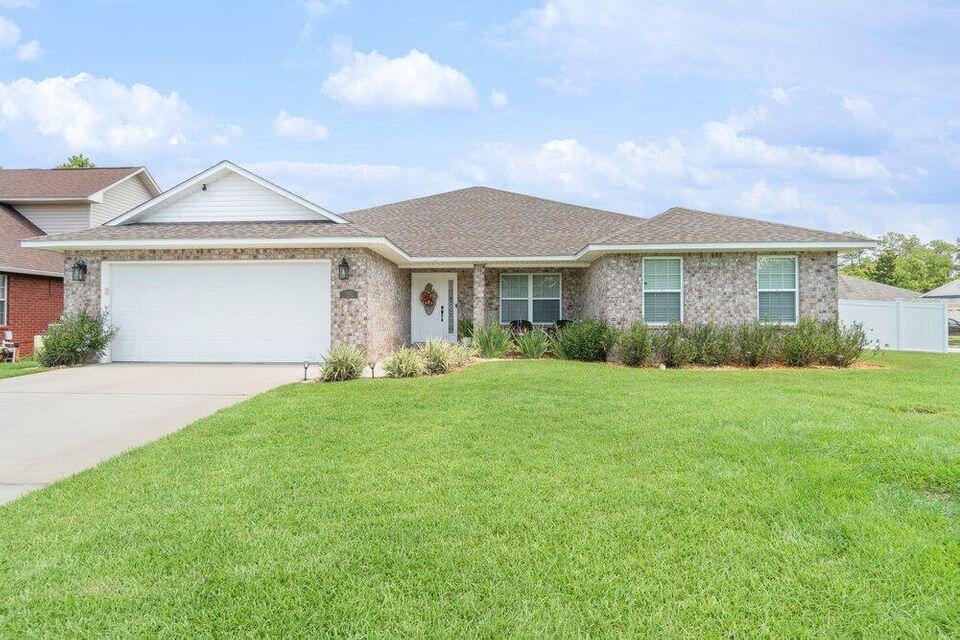 Welcome to '3 bedroom in Sound Hammock Navarre!!' -- a well-appointed 3-bedroom, 2-bath home on a desirable corner lot. Situated minutes from the beach, the property offers a large lot and a generous covered patio ideal for outdoor living. Inside, the main bathroom features a double custom closet and the kitchen includes a breakfast bar for casual dining. Residents also have access to a community pool. Convenient location and functional layout make this home an attractive option for those seeking coastal living in Navarre. Conveniently located and move-in ready, this house is a perfect place to call home. Don't miss your chance to see it! Schedule a showing today. Call 850-729-0399 View rental requirements or apply at www.RentwithBSR.com

No smoking or vaping. A small dog may be allowed with some restrictions and a $400 non-refundable pet fee. FEES: $50 per adult 18+ application fee, Landlord Liability Policy (if proof of Renter's coverage is not provided) $15 mo, Pest Assurance pest control policy $20 mo.