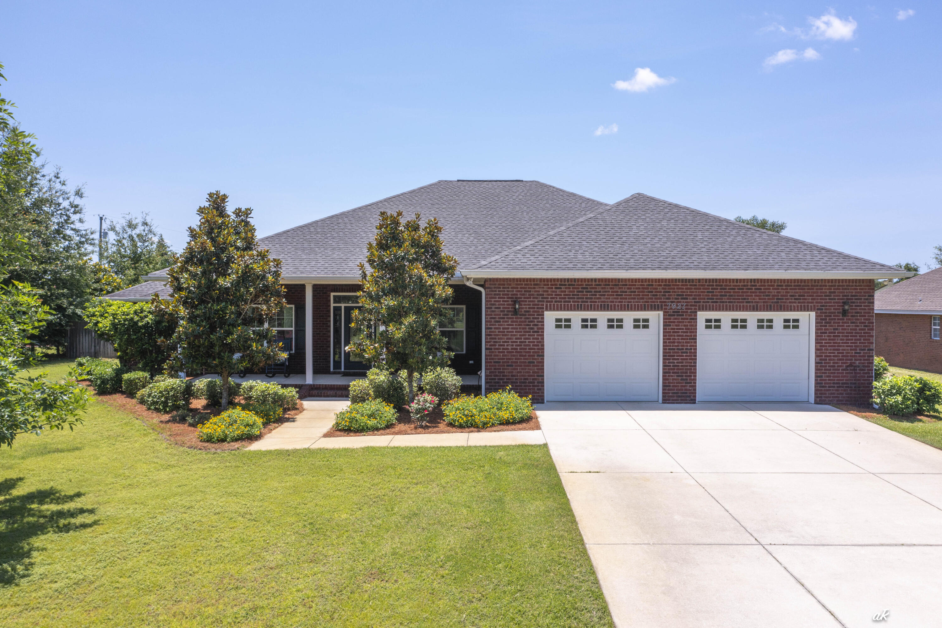 Welcome to 7927 Highpoint Road, where peaceful country living meets everyday convenience. This custom-built, all-brick home sits on a large lot with no HOA, giving you the freedom and space that's becoming harder to find. Located just a short walk from Deerpoint Lake and the Deerpoint Lake boat ramp, you'll enjoy easy access to fishing, boating, and the outdoor lifestyle that makes this area so special--all while being just minutes from Lynn Haven. Inside, you'll find 4 bedrooms, 2 bathrooms, beautiful tile floors, crown molding, and quality craftsmanship throughout. The open-concept design features a spacious family room, dining area, and an entertainer's kitchen complete with custom cabinetry and a large eat-at island that serves as the heart of the home. Enjoy your morning coffee on the welcoming front porch or unwind in the screened back porch overlooking the expansive backyard. There's plenty of room to add a pool, park your RV, or simply enjoy the privacy and space this property offers. An oversized two-car garage provides ample storage for vehicles, tools, and outdoor equipment. Homes like this are becoming increasingly rare. Built with the quality and attention to detail that stand the test of time, this is the kind of home they simply don't build anymore--but they certainly should. Schedule your private tour today and experience everything 7927 Highpoint Road has to offer.
