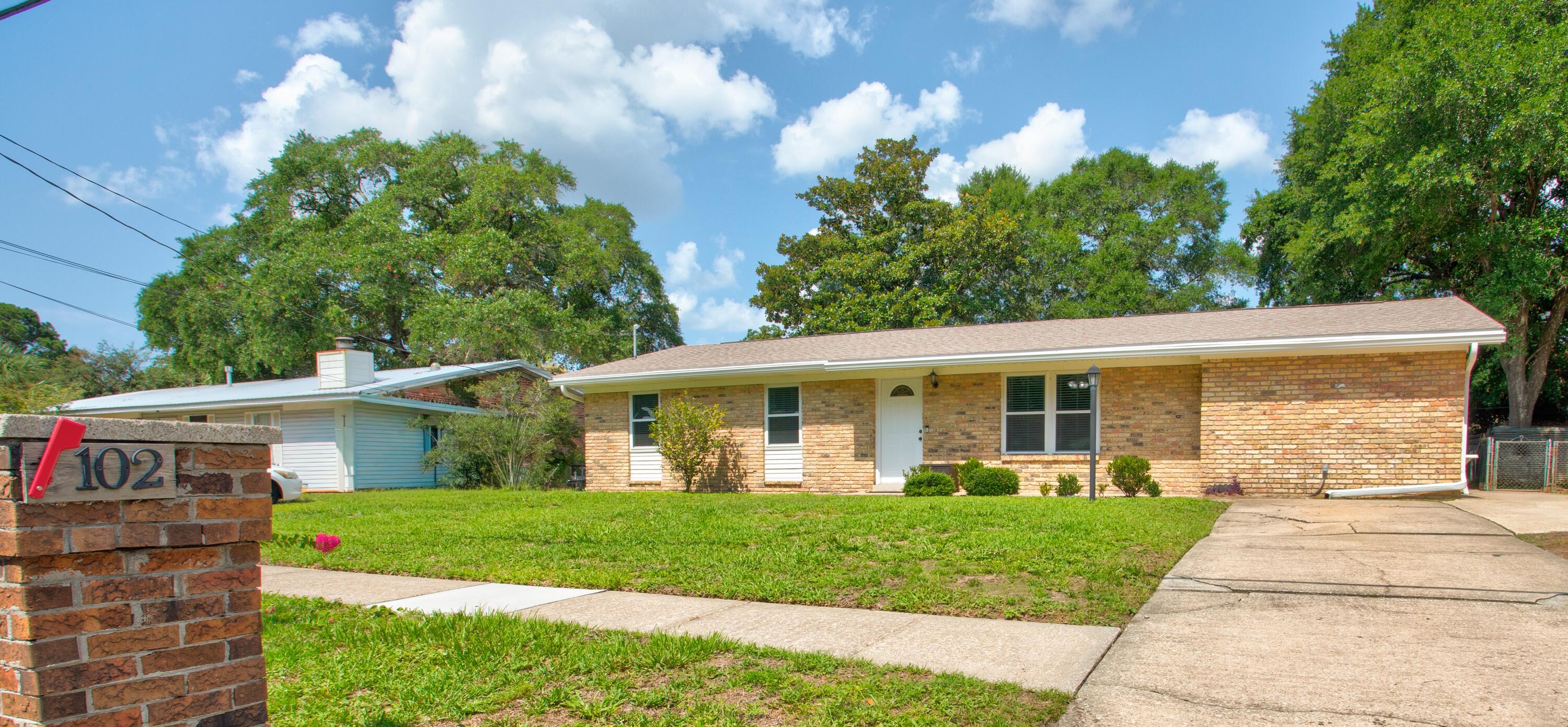 Move in and enjoy from day one!  Most of the home's major improvements have already been completed, including a new roof (2025), new HVAC system (2025), complete whole-house rewire (2026), fresh whole-house interior paint (2026), replacement windows, and a water heater replaced in 2023. Add the beautifully updated kitchen with quartz countertops, natural gas cooking, and inviting outdoor living spaces, and you'll find a home that's ready to welcome its next owner. Centrally located in Fort Walton Beach, this home offers convenient access to Hurlburt Field, Eglin Air Force Base, shopping, dining, healthcare, schools, and the beautiful beaches of the Destin-Fort Walton Beach area. Imagine beginning your weekend with coffee beneath the pergola before heading to the county boat ramp about a quarter mile away, or spending the day at nearby Ferry Park, offering pickleball and tennis courts, ball fields, playgrounds, and walking trails. End the day grilling with the convenience of the natural gas connection or relaxing on the covered, screened in back porch. Inside, this thoughtfully maintained 3-bedroom, 2-bath home offers 1,761 square feet with two spacious living areas, a separate dining room, abundant storage, and a powered storage shed. Outside, enjoy gardening or playing games in a fully privacy-fenced backyard with raised garden beds, rain barrels supplied by 6-inch screened gutters, and a lawn pump with four-zone irrigation. Schedule your appointment to see this home today!