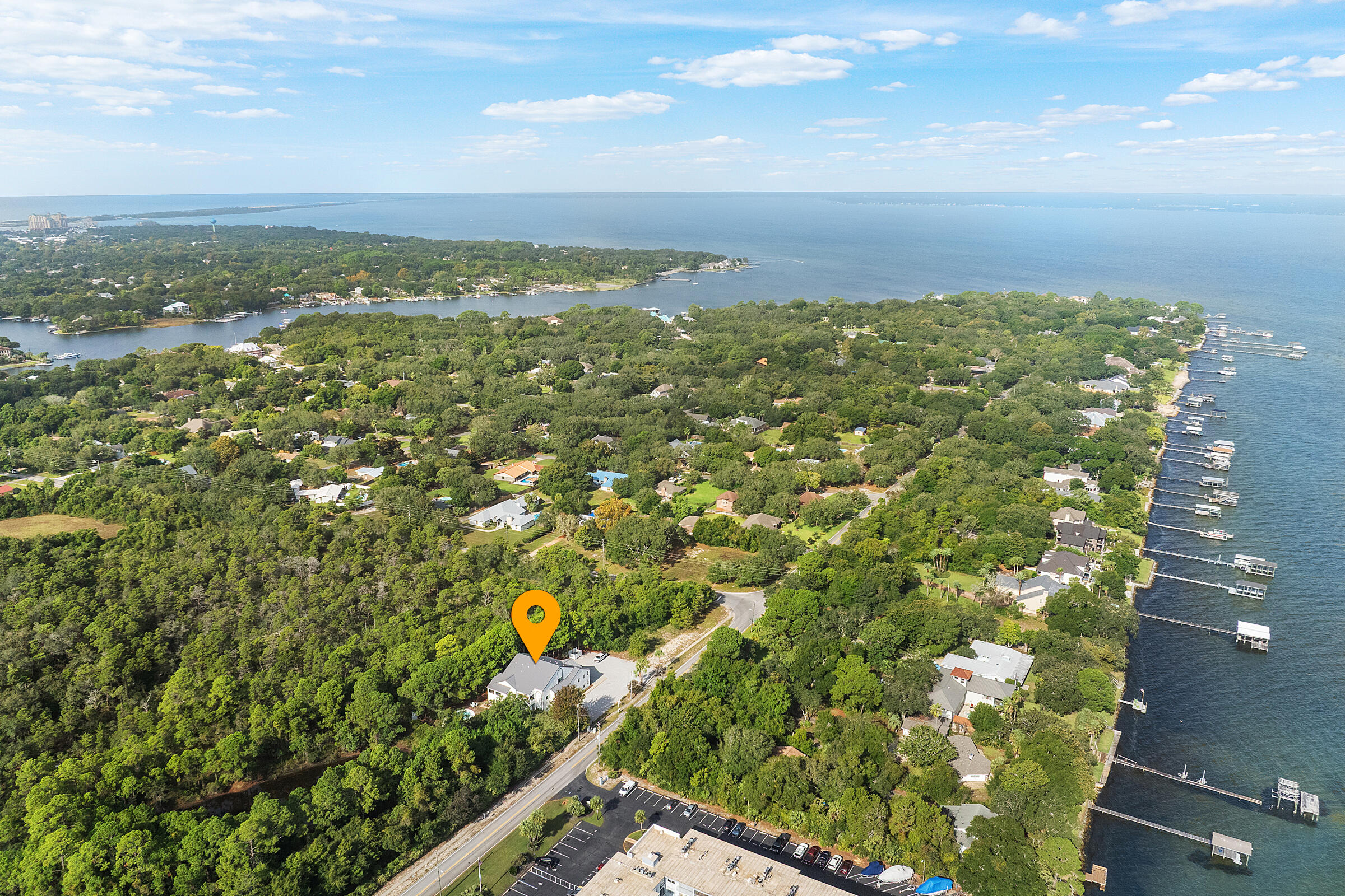 Ground-floor 1BR/1BA condo located on the east side of the building, just steps from the pool. This Destin condo offers easy access entry (no stairs), a separate dining area, breakfast bar, tile flooring in the kitchen and bath, and a stackable washer and dryer.
Enjoy a quiet, low-density setting in an 8-unit community-perfect as a primary residence, second home, or income-producing investment property. Investor-friendly location makes this a strong opportunity.
Conveniently located across from the bay and just 2.5 miles to Henderson Beach State Park, with easy access to public beach access, shopping, dining, and the new Publix.
Recent building updates include full exterior repaint and a new 30-year metal roof (2024), offering low-maintenance ownership. VA buyers may qualify for 100% financing. Condo may be eligible for FHA spot approval.
A rare opportunity and one of the best values in Destin for a ground-floor, move-in ready condo.